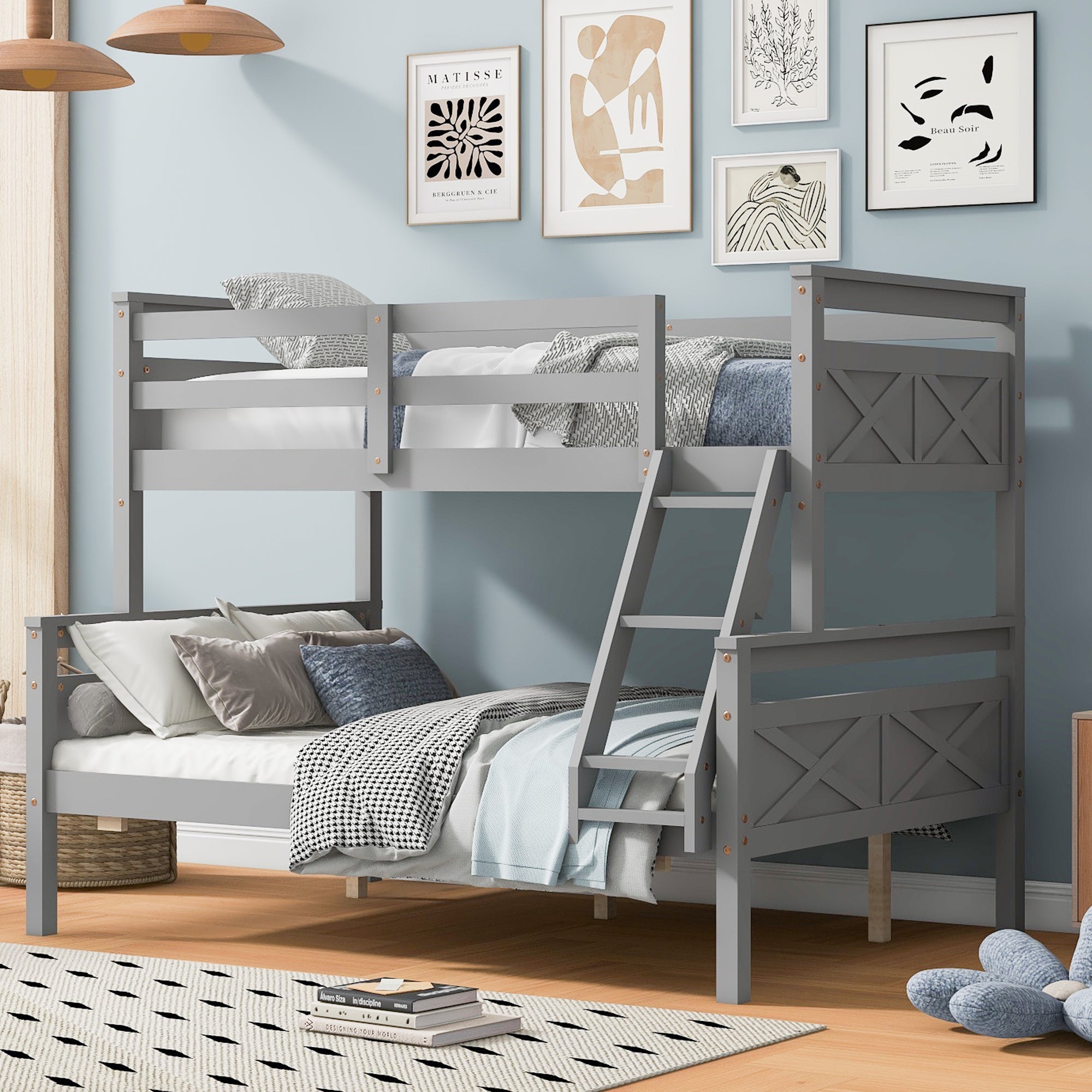 Gray twin-over-full bunk bed shown with upper and lower mattresses for size comparison