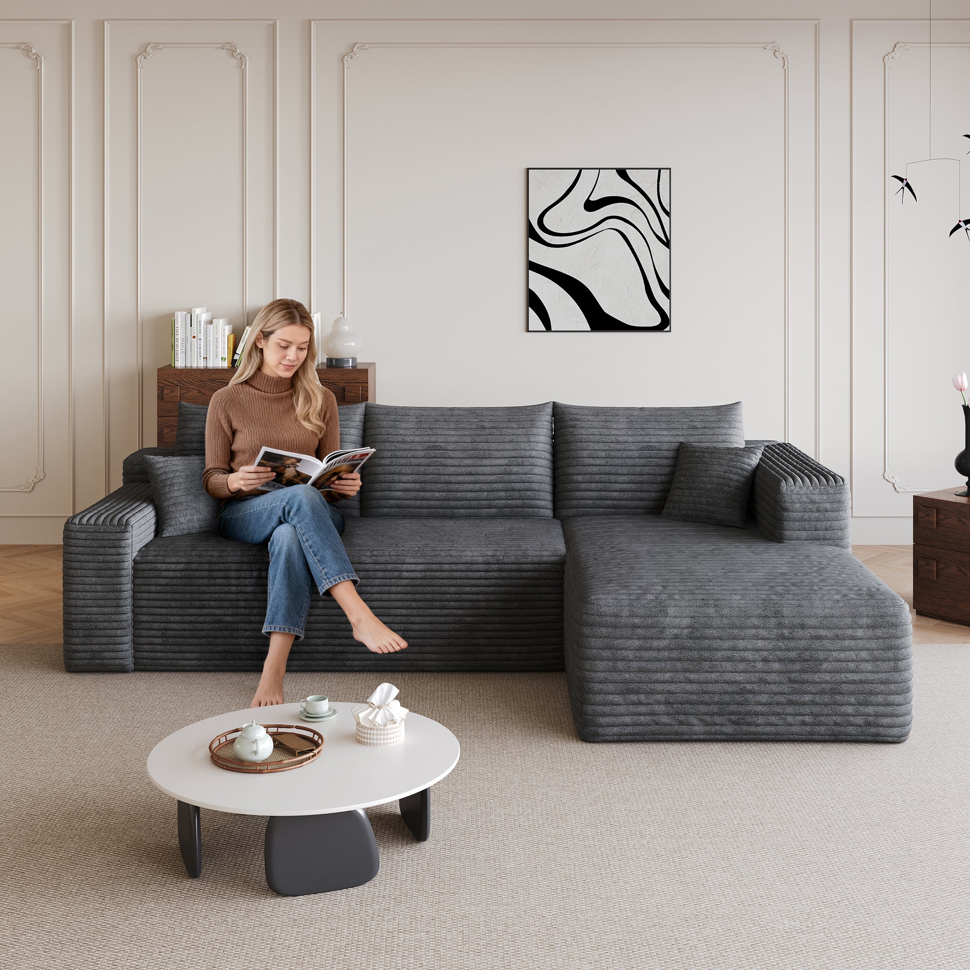 Dark grey deep-seat corduroy sectional sofa in living room setting