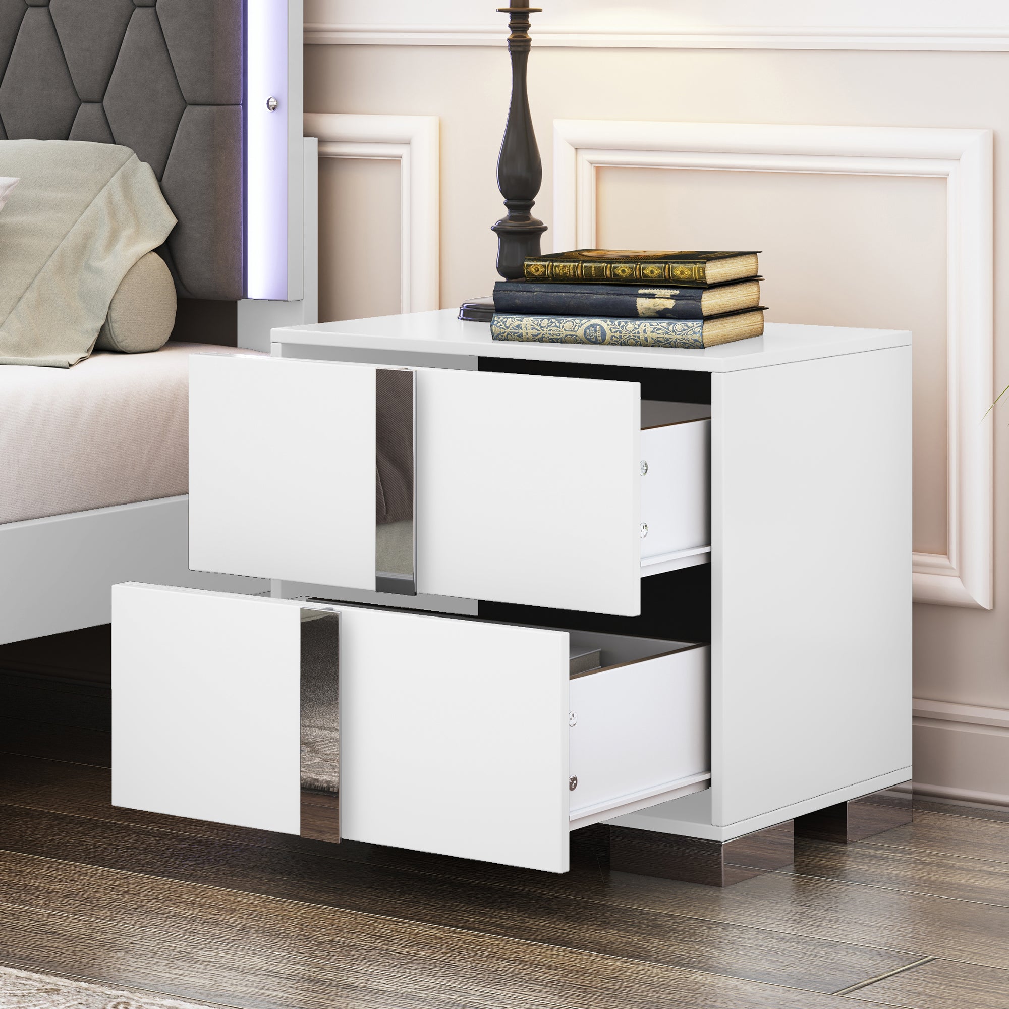 White mirrored bedside table with metal foot, angled view