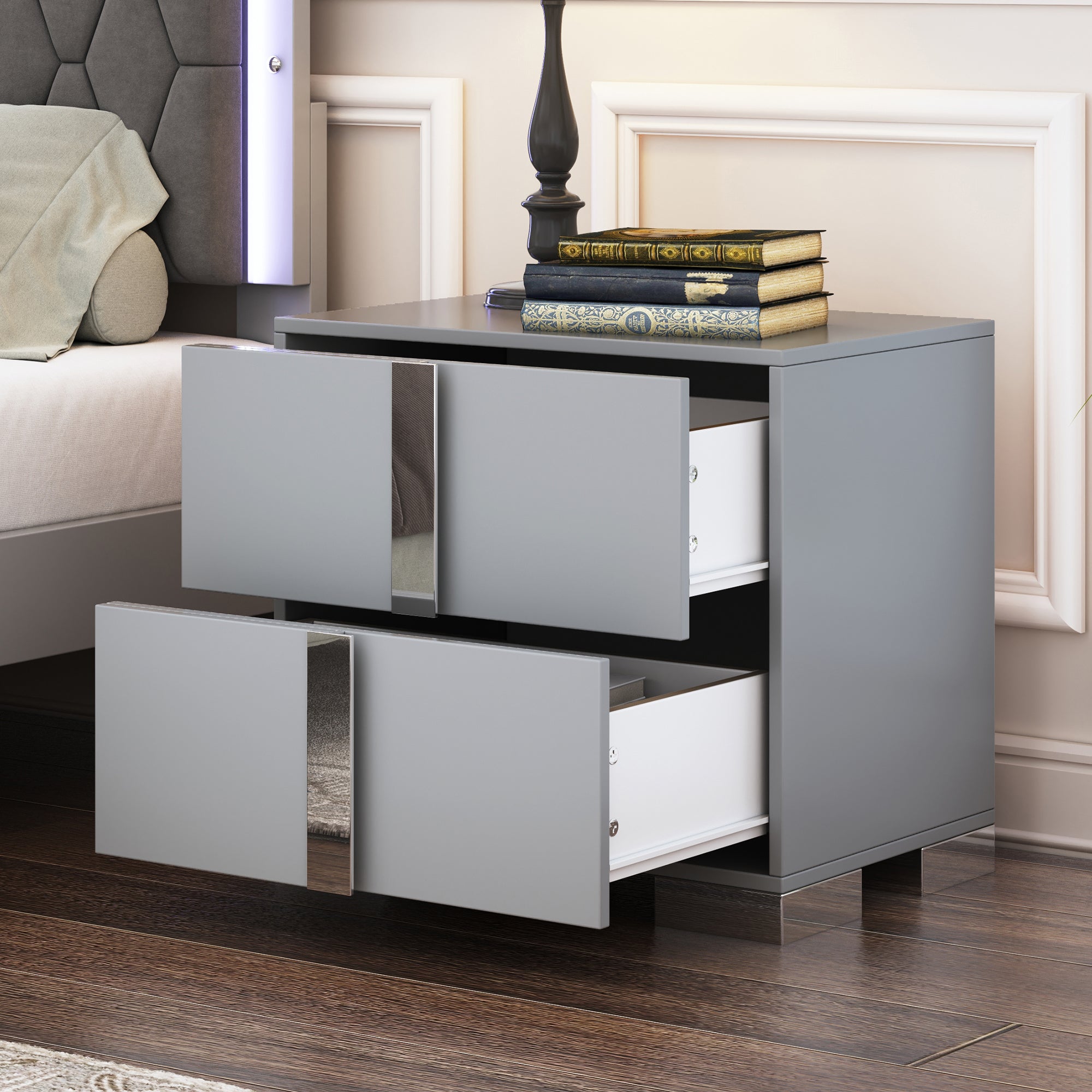 Gray mirrored bedside table with two drawers, angled view