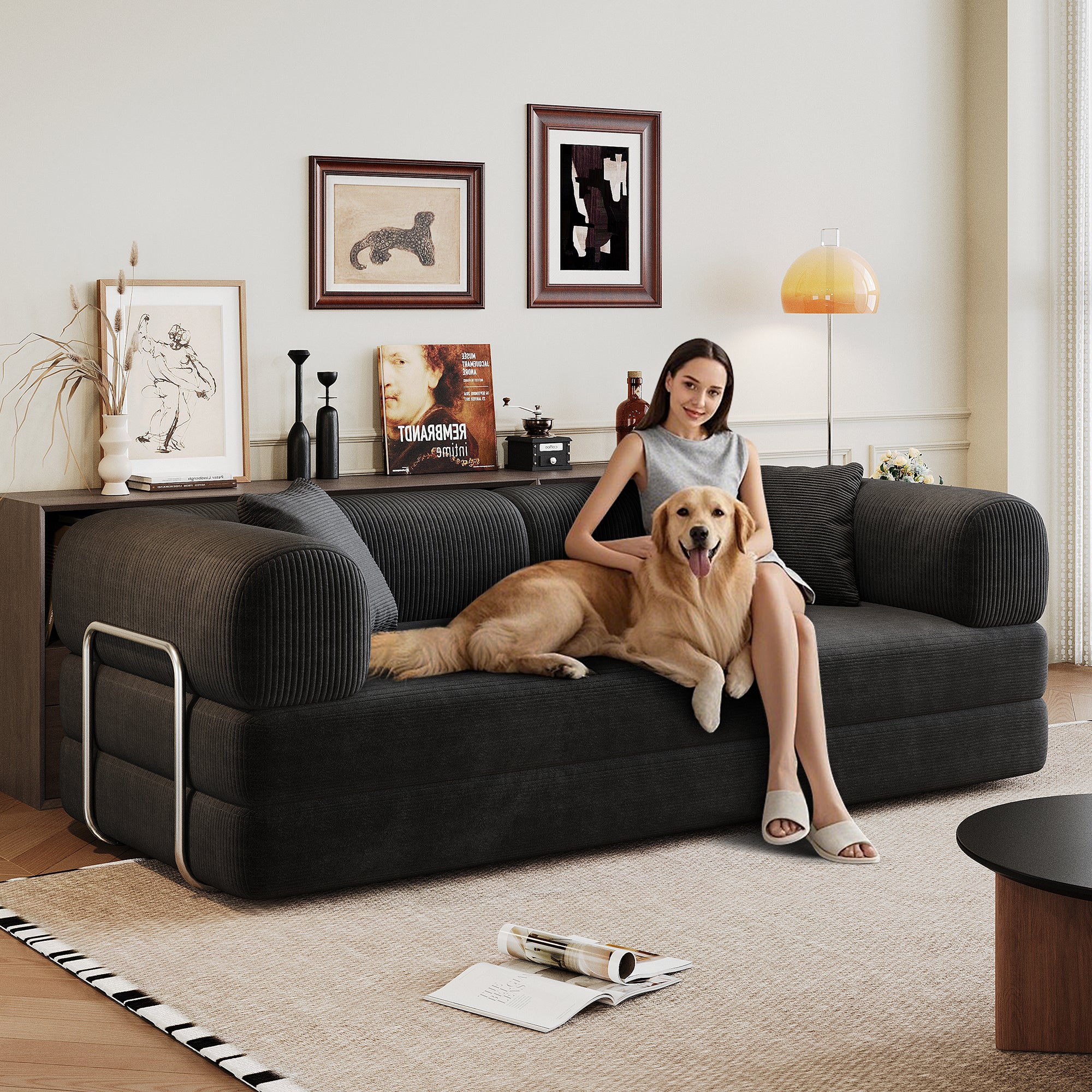 Black corduroy convertible floor sofa bed corduroy fabric texture close-up