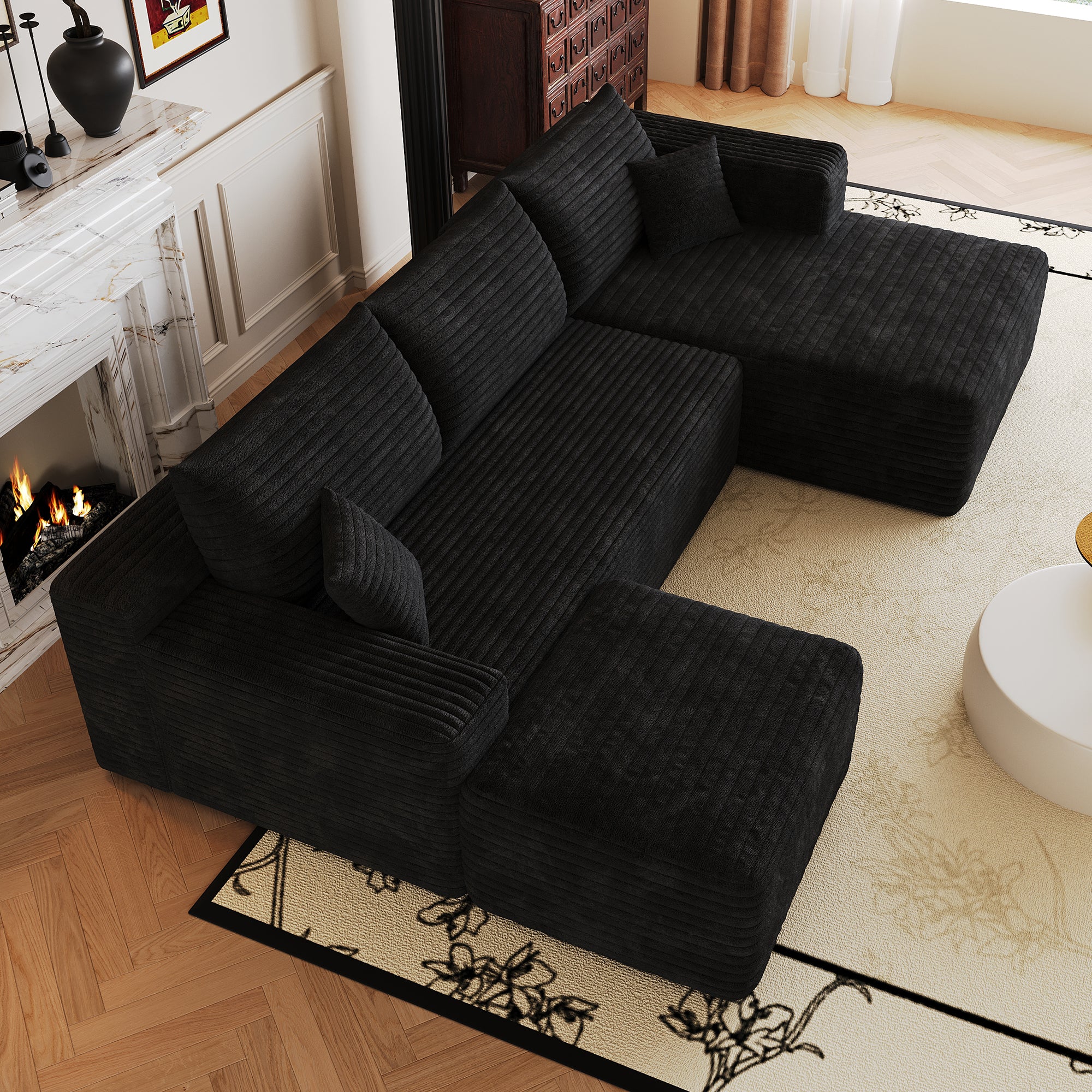 Black corduroy fabric texture close-up on sectional sofa