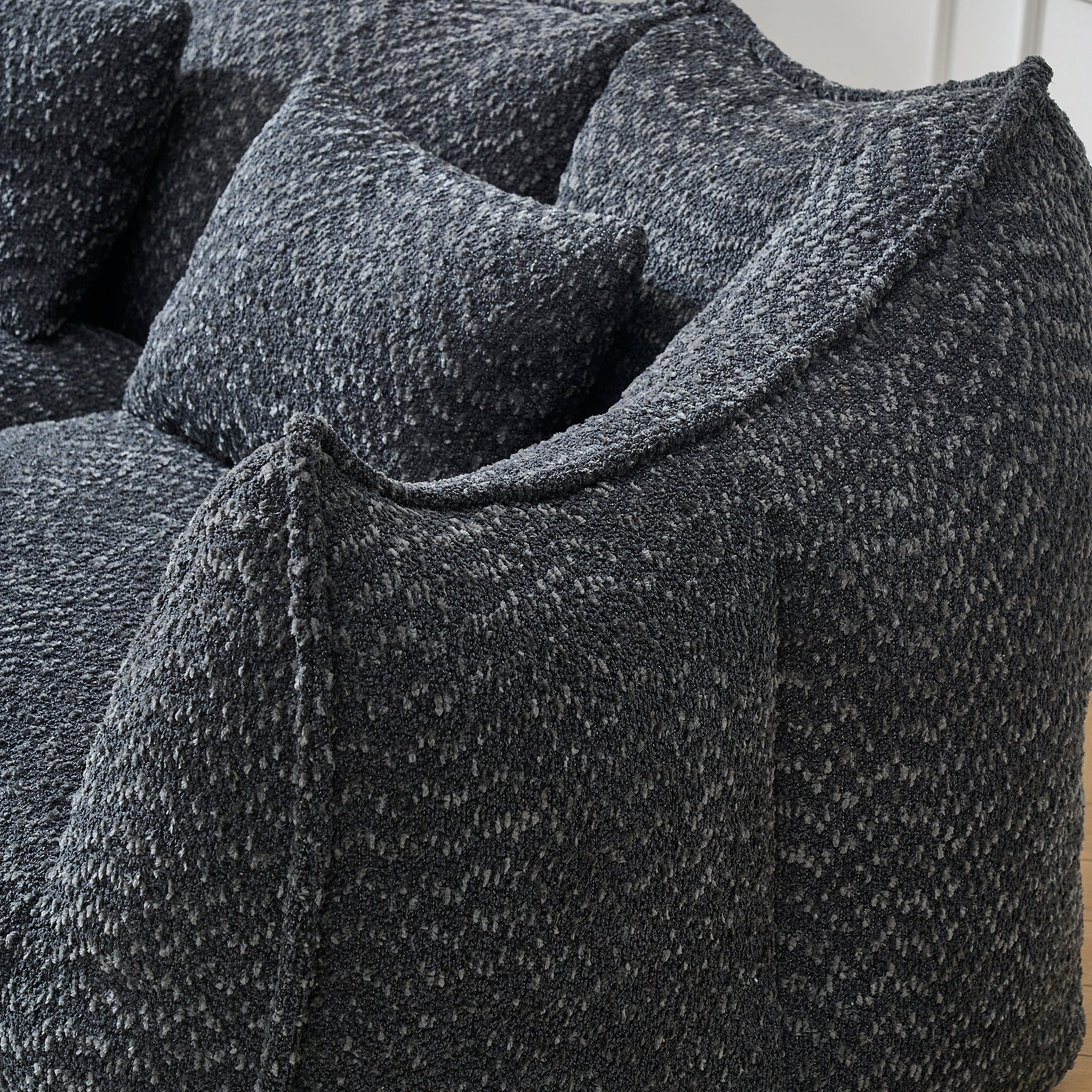 Two-person bean bag sofa with high-resilience foam core, side view