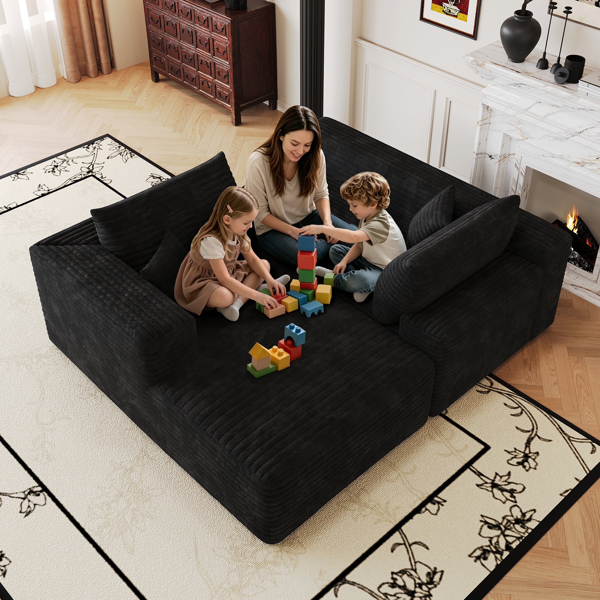 Black corduroy L-shaped corner couch, living room setting
