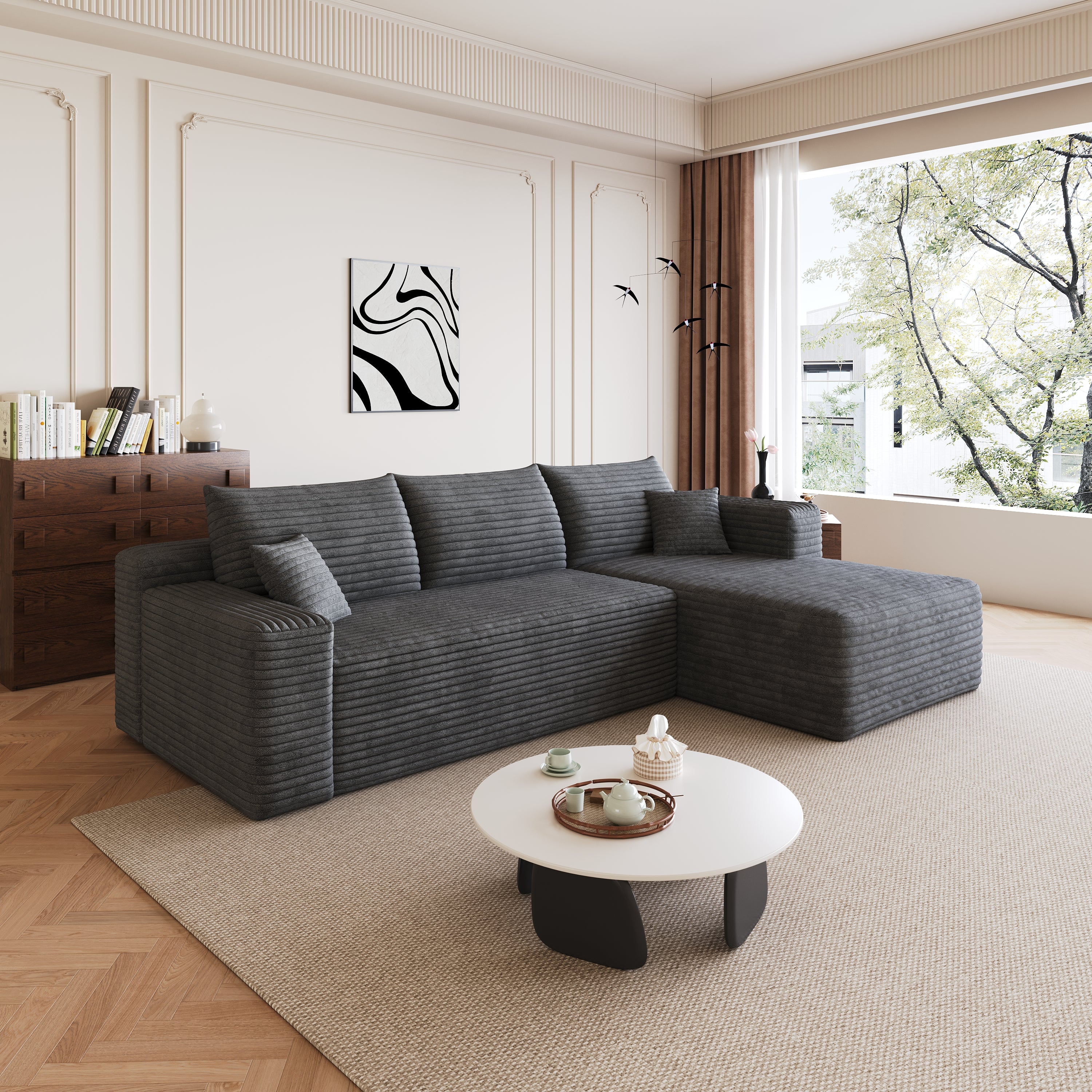 Plush corduroy fabric texture detail of dark grey sectional sofa