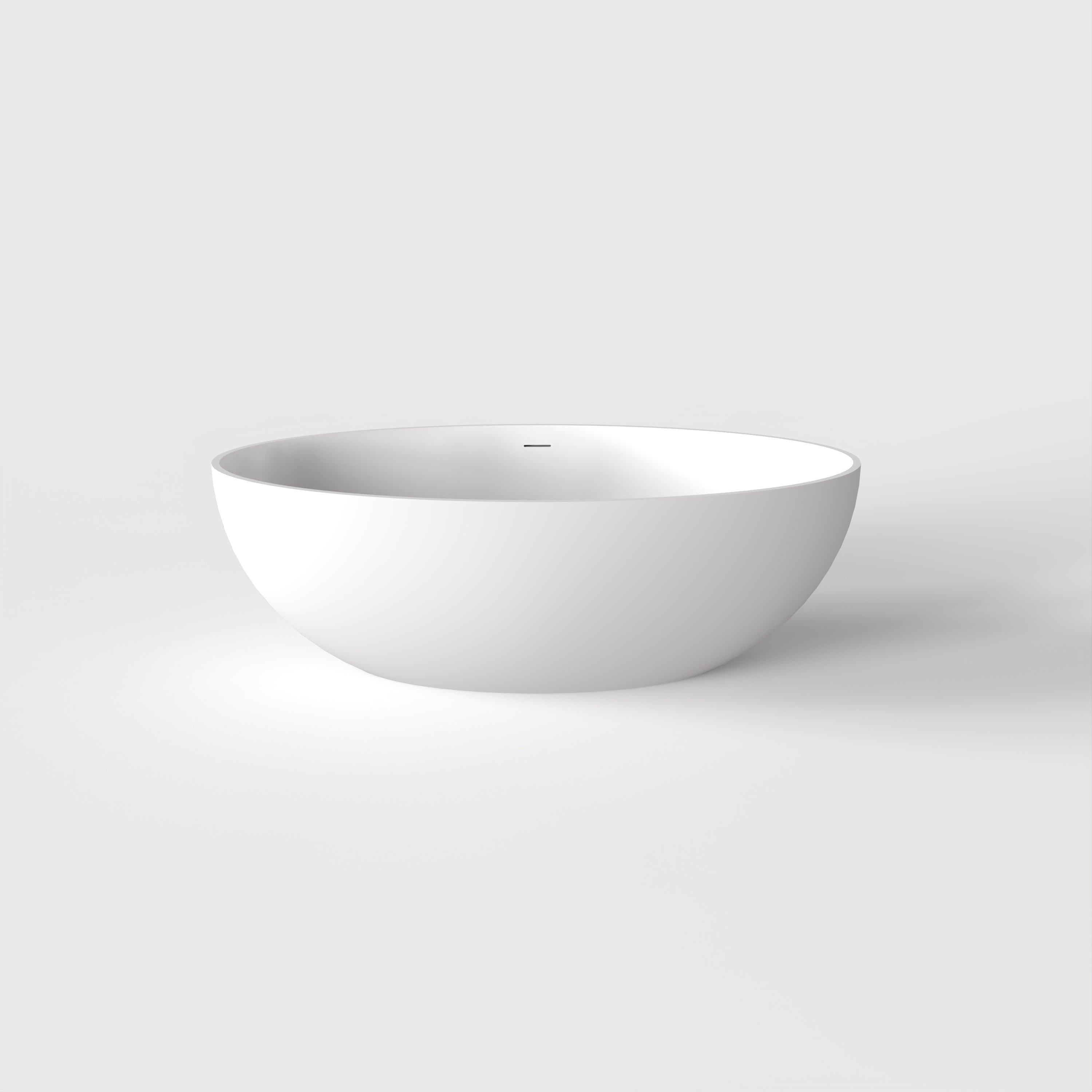 67 inch freestanding solid surface soaking bathtub in bathroom setting