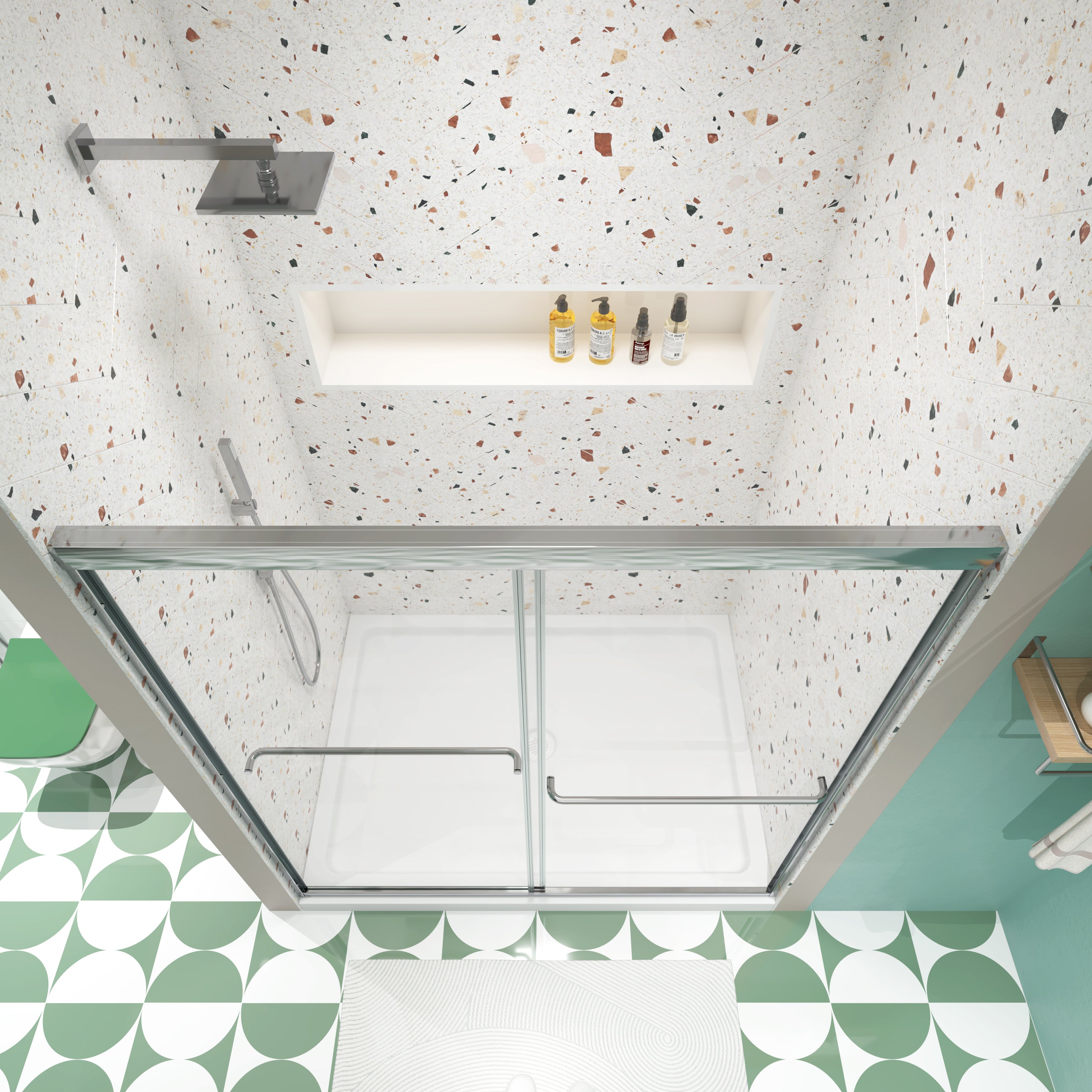 Chrome bypass shower door track and glass detail