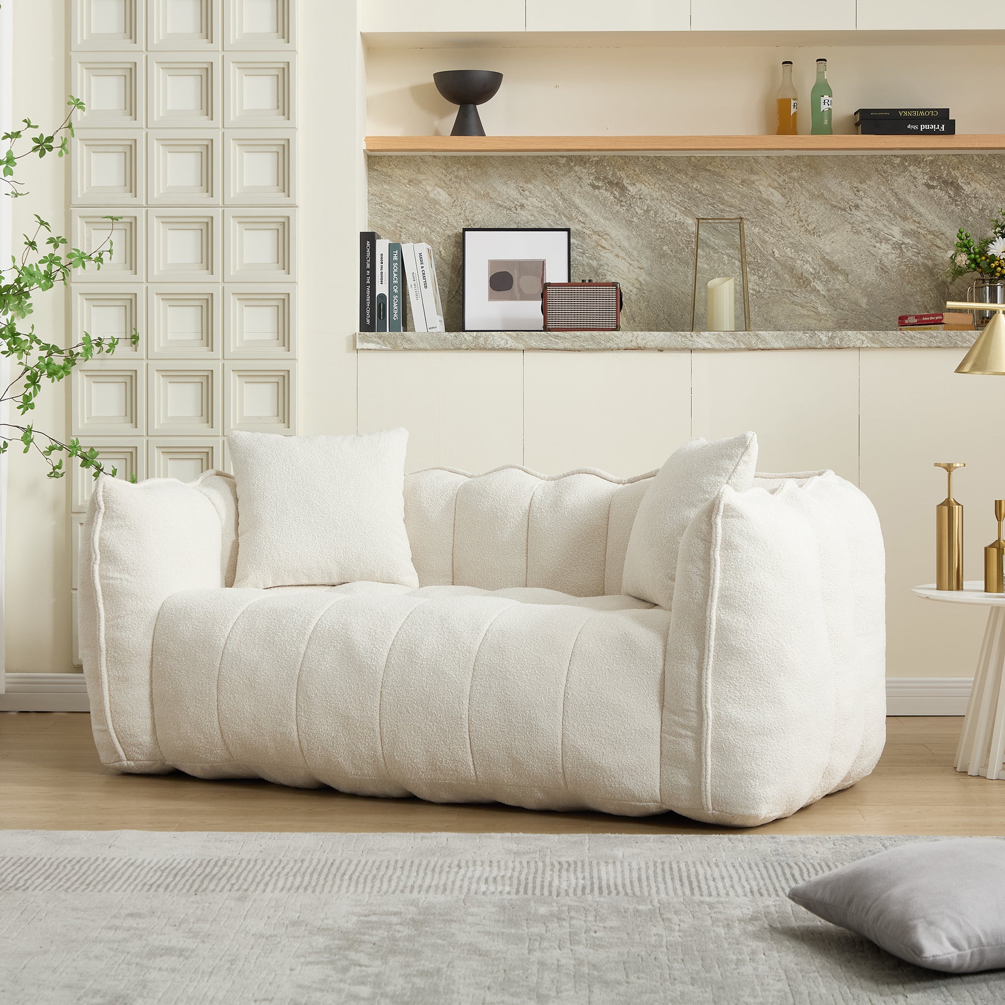 Square beanbag recliner sofa for two people, angled side view