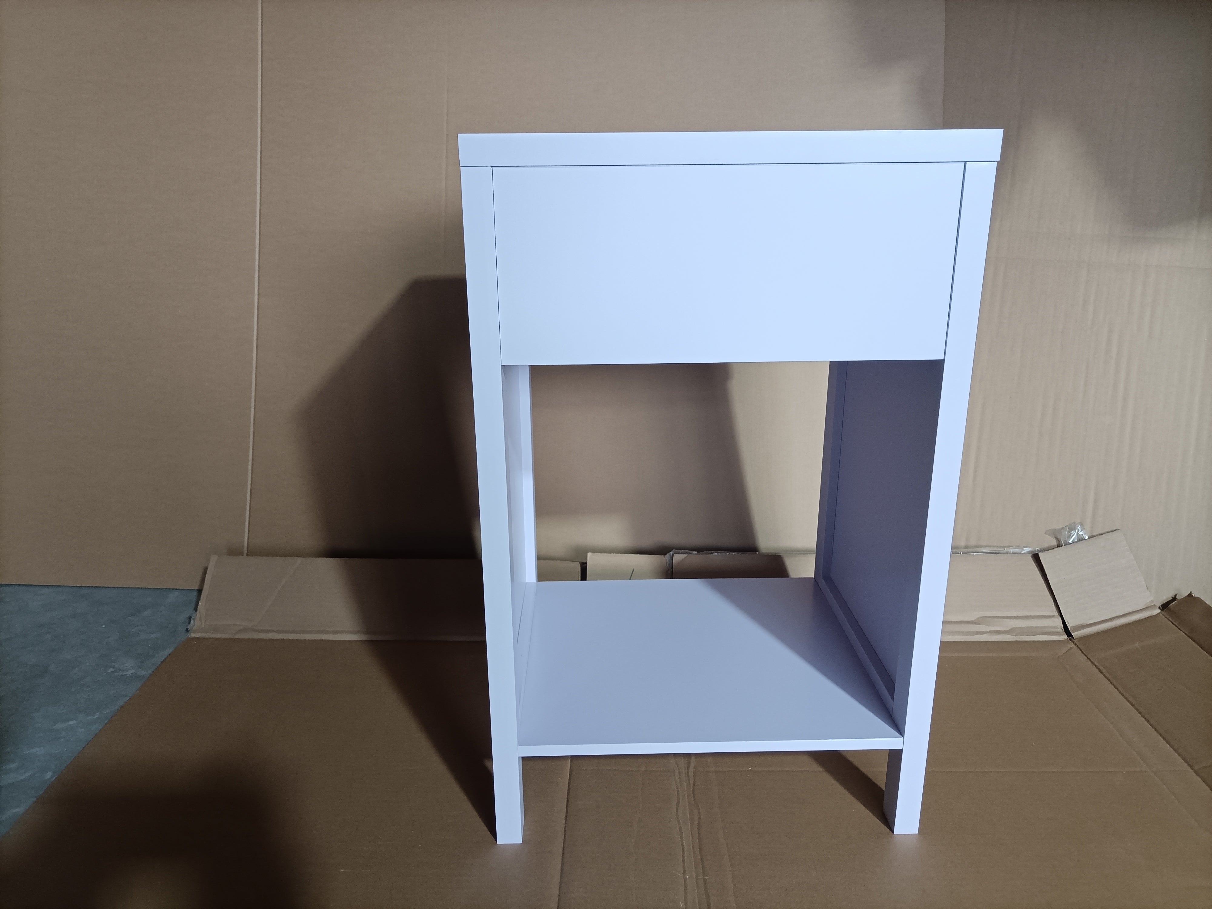 Light purple minimalist side table with scalloped edge, side view