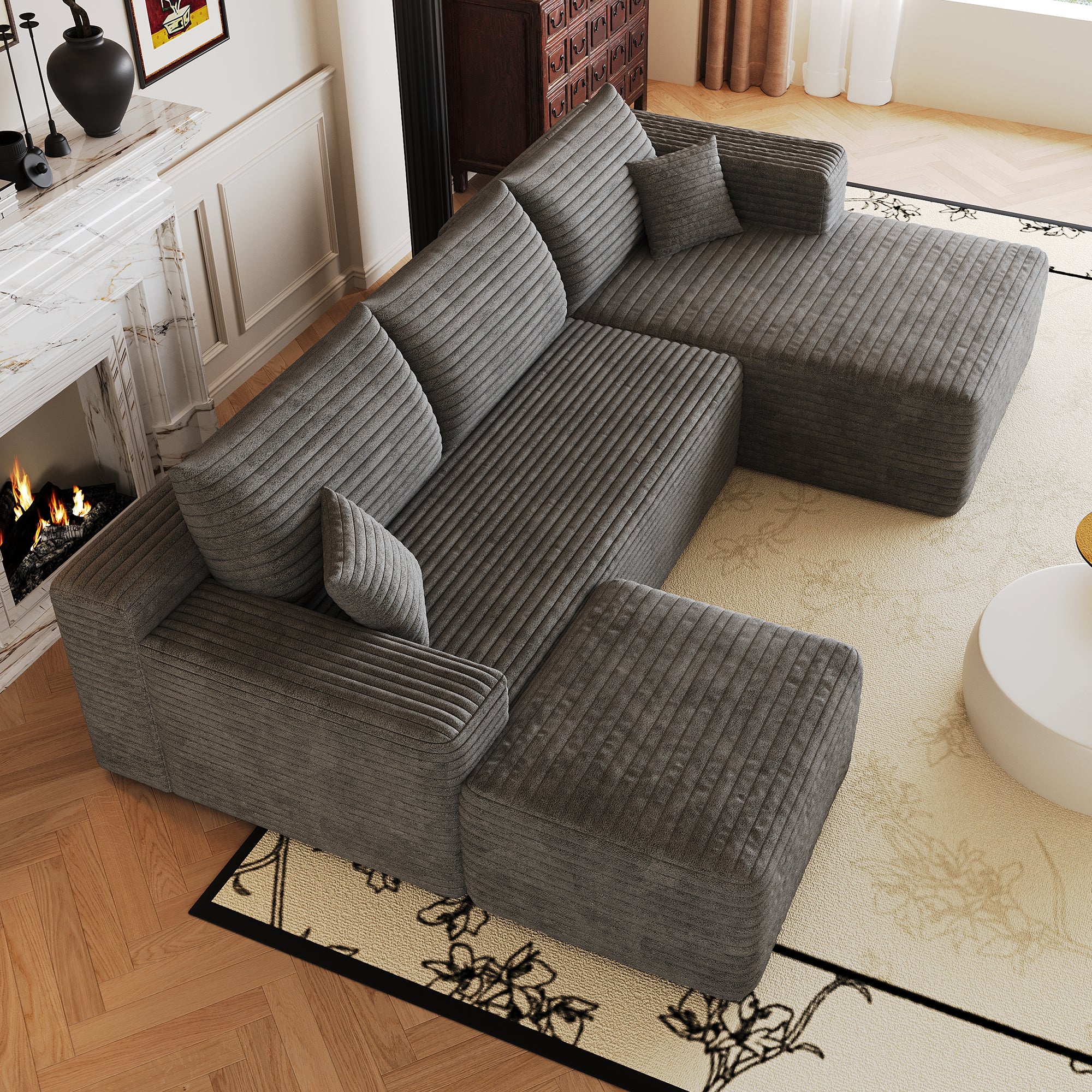 Plush corduroy dark grey L-shaped sectional sofa, corner detail