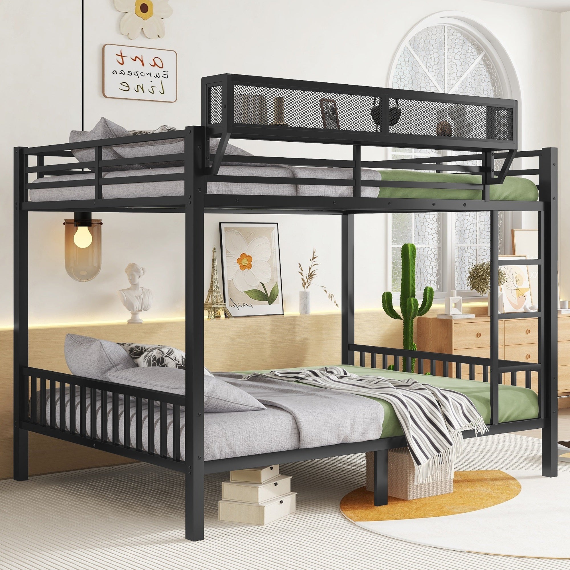 Black queen over queen bunk bed shown in a bedroom