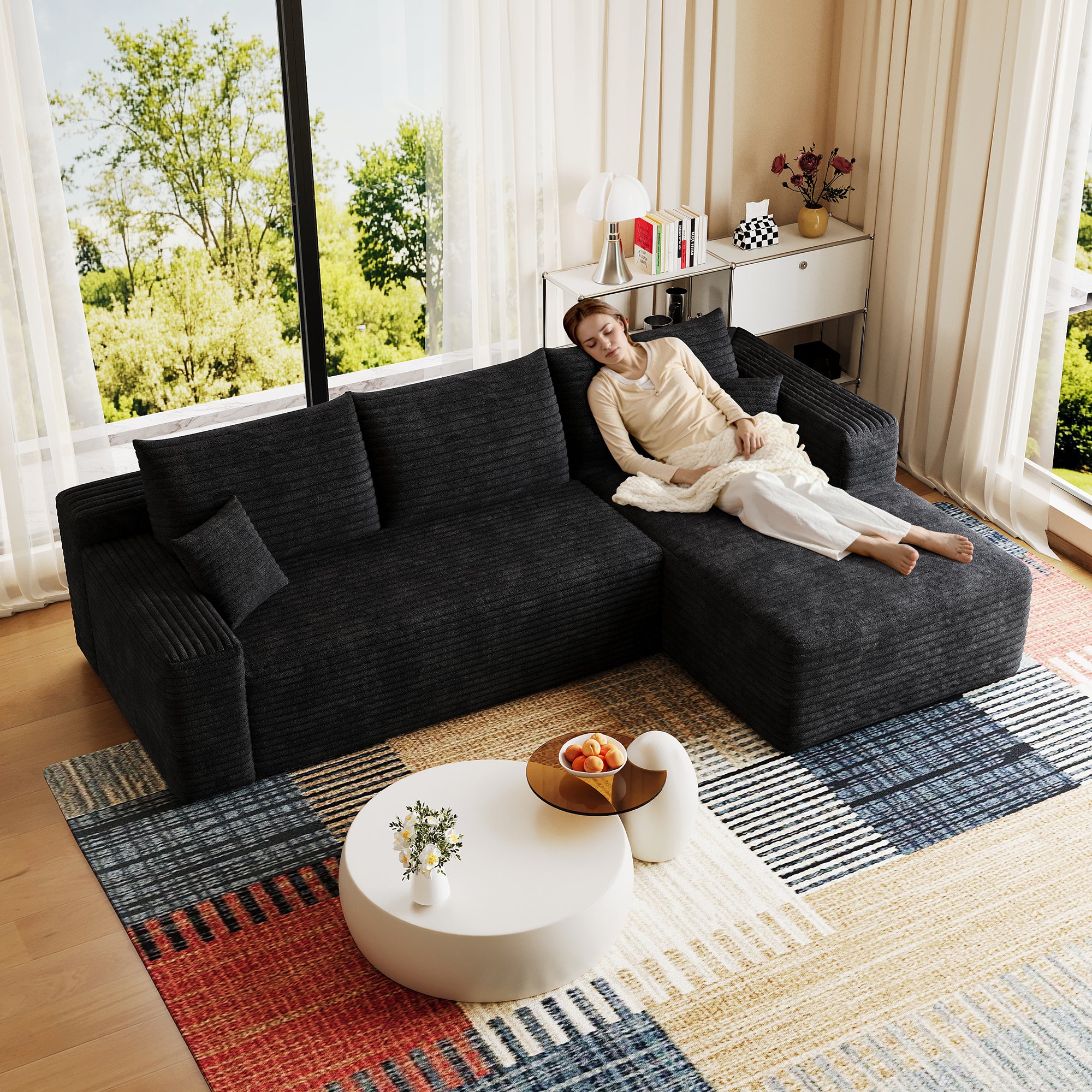 Black corduroy U-shaped sectional sofa in modern minimalist living room
