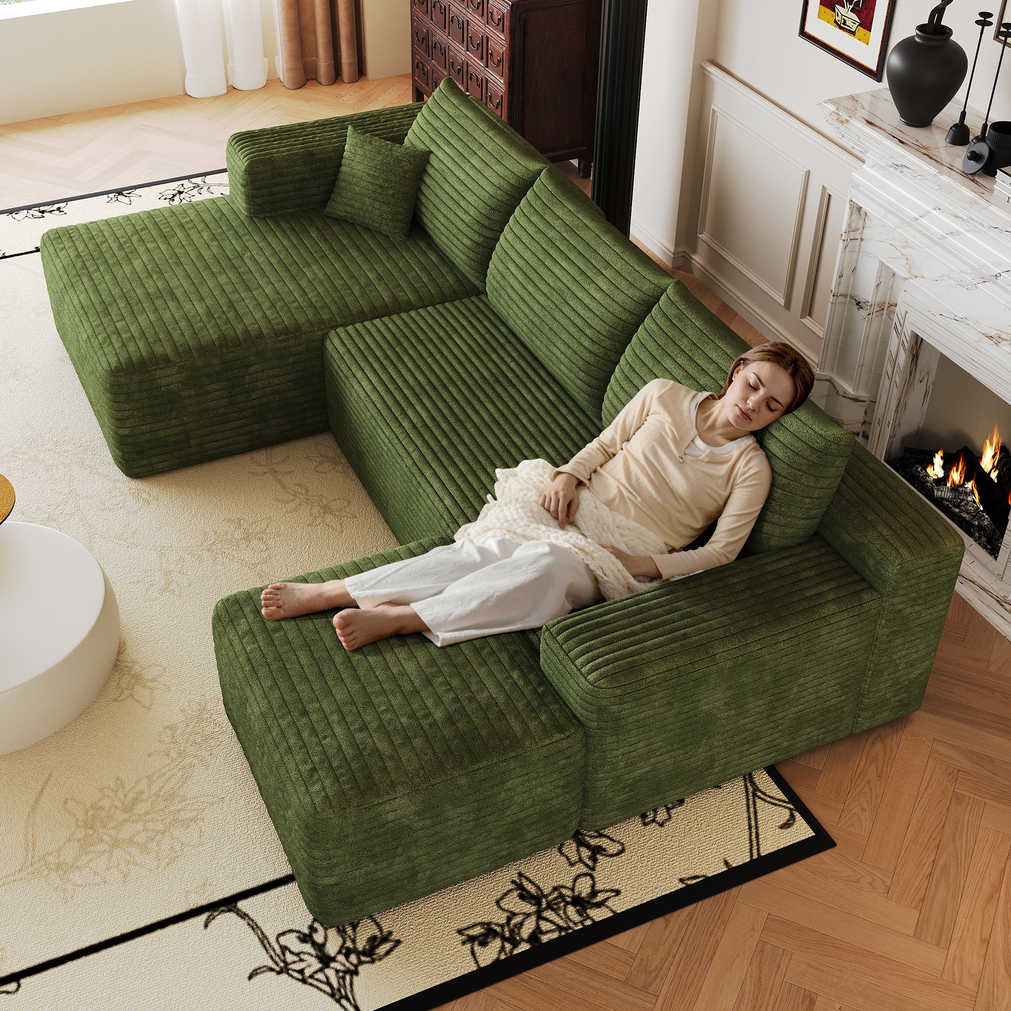 Green corduroy deep-seat corner sofa, side profile view