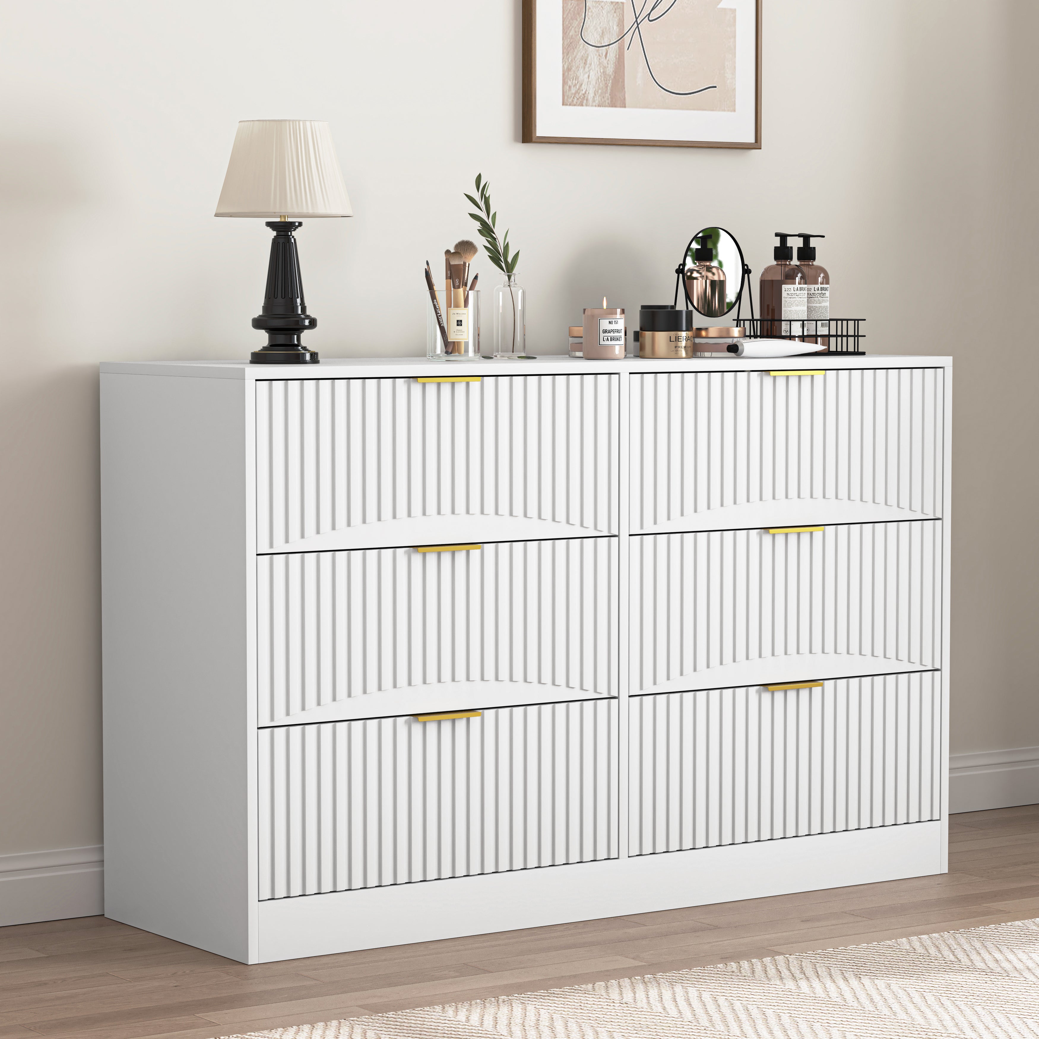 White modern dresser with six drawers open showing storage, front detail