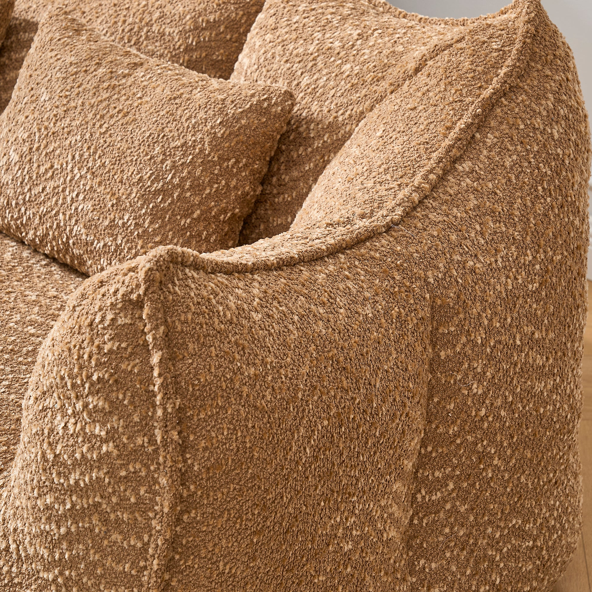 Soft square beanbag recliner sofa in family room, side view