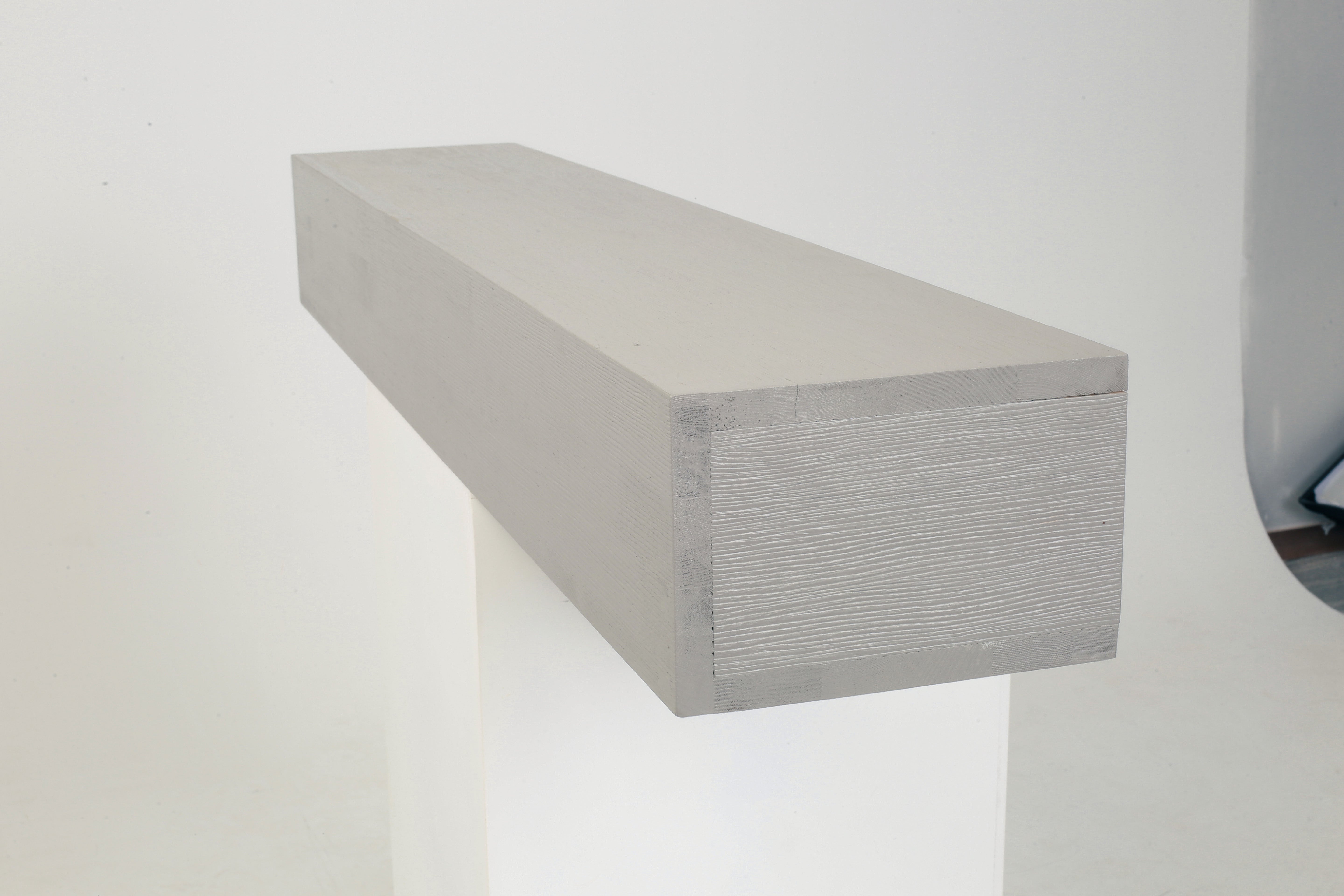 Rustic wood fireplace mantel shelf, wood grain detail