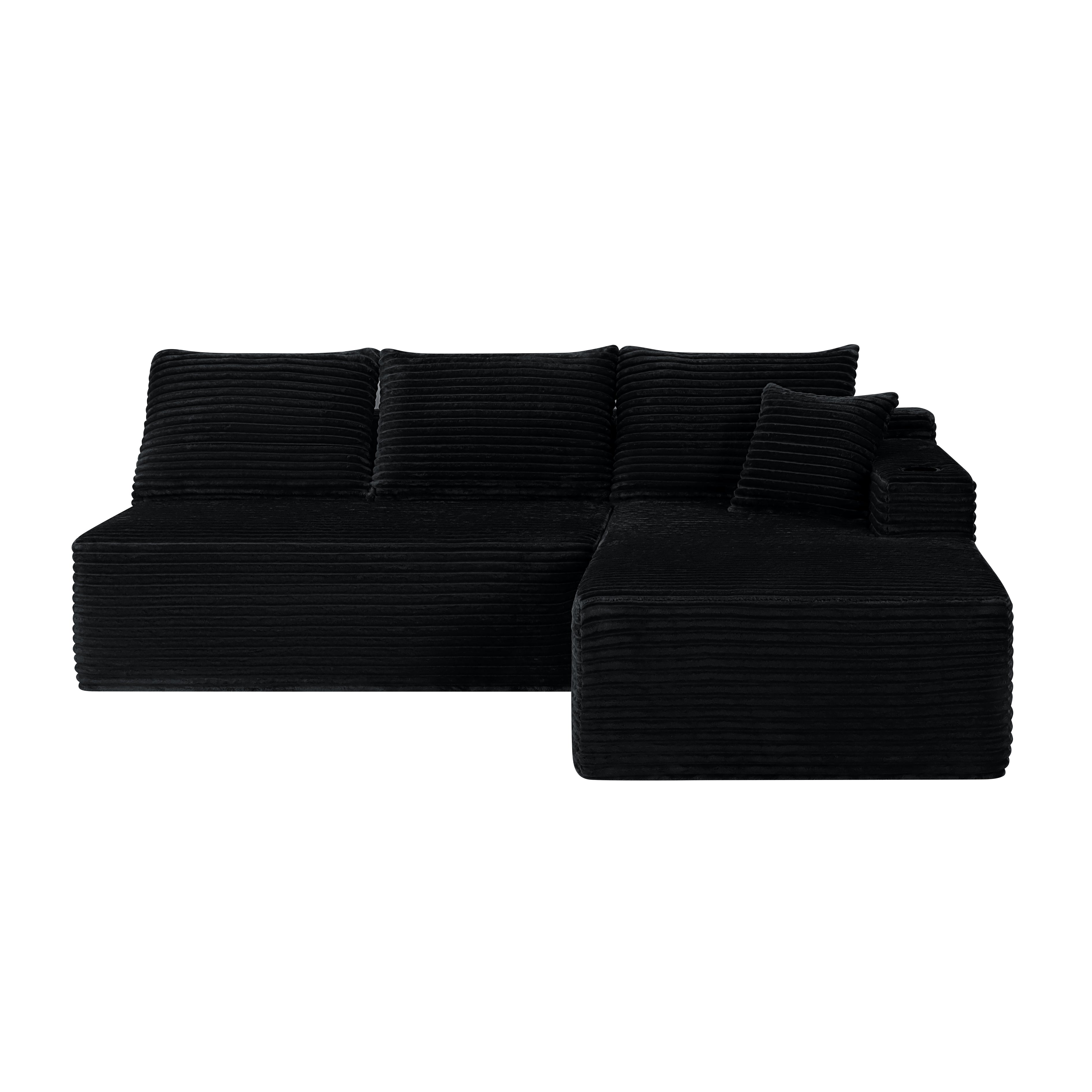 Black plush deep-seat cloud sectional sofa with L-shape chaise, angled view