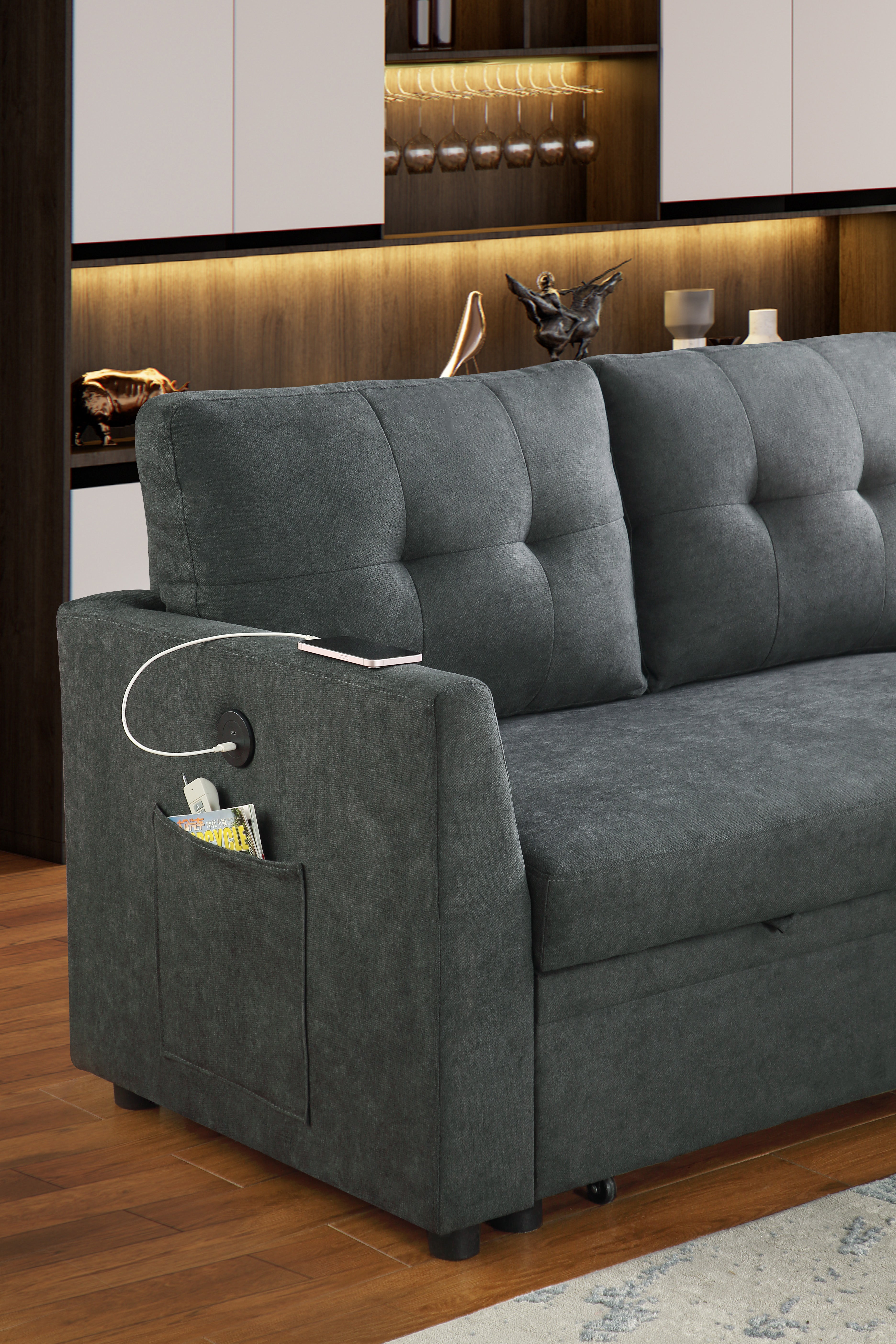 Sectional sofa bed shown in L-shaped living-room configuration, angled view