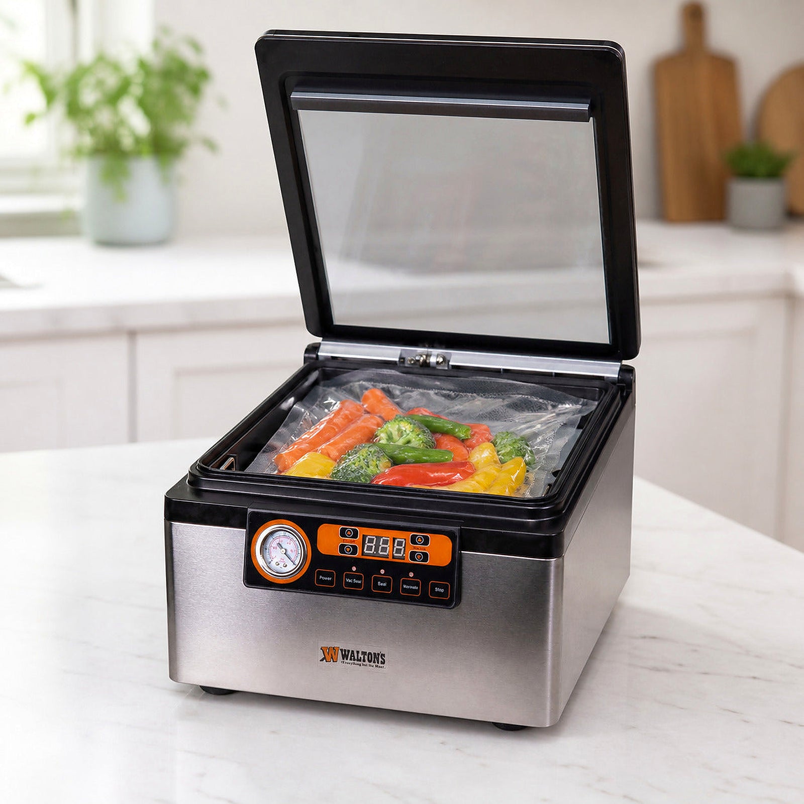 Walton's Compact Chamber Vacuum Sealer with vegetables in the open chamber