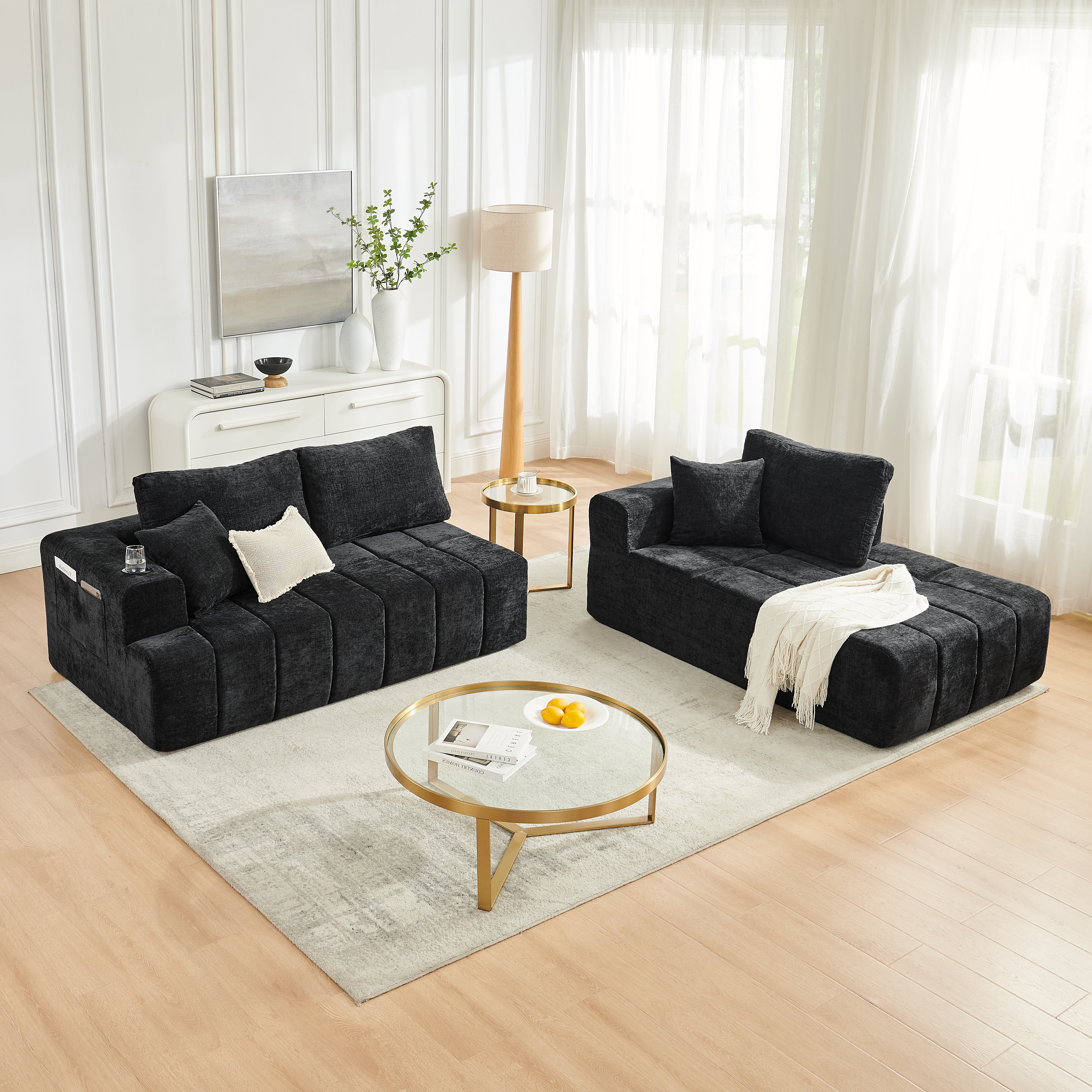 Black chenille boneless sofa with integrated cup holders, close-up