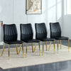 Four black dining chairs. A medieval modern chair made of PU material with soft cushions, equipped with golden metal legs. Suitable for restaurants and living rooms