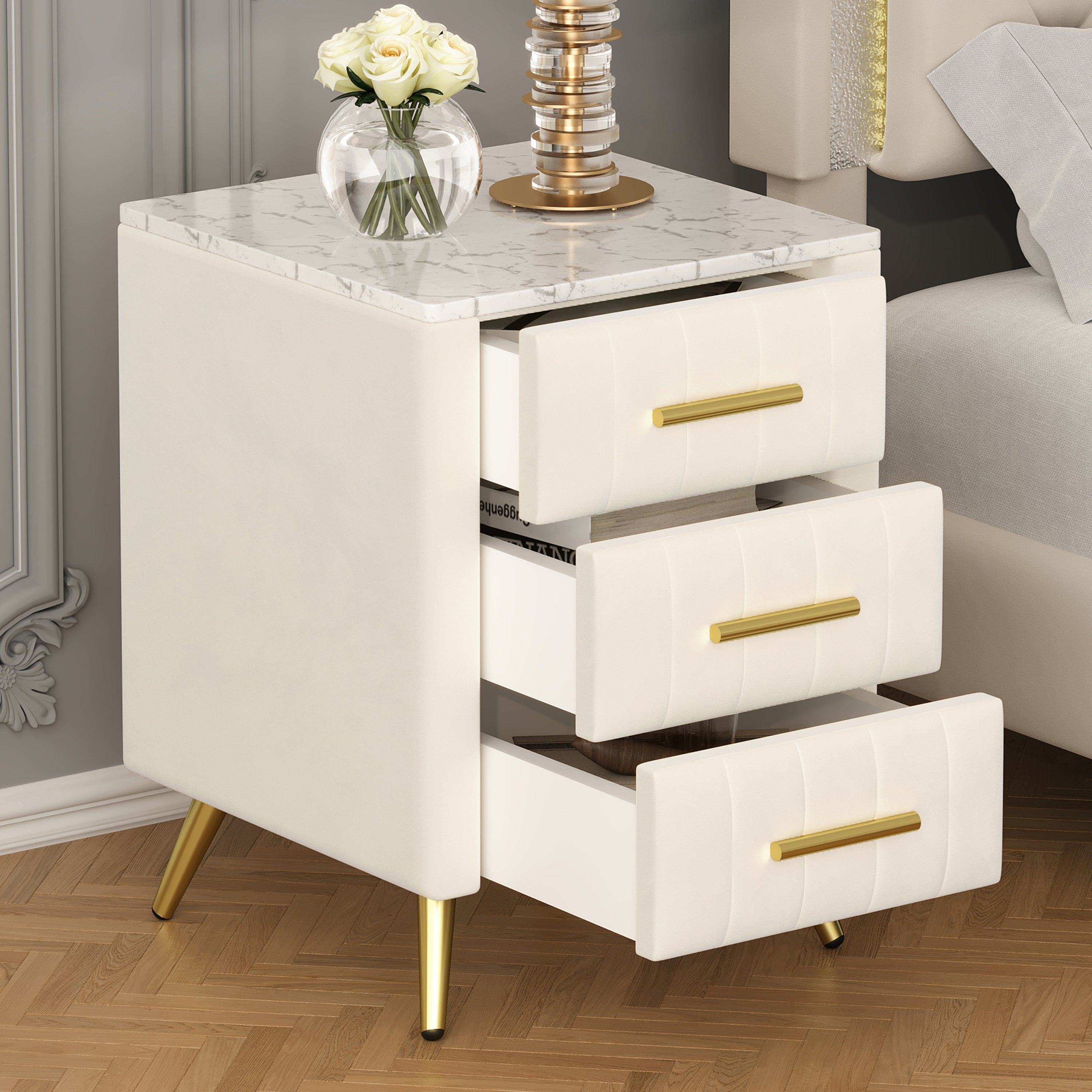 Beige nightstand with metal legs and handles, angled view