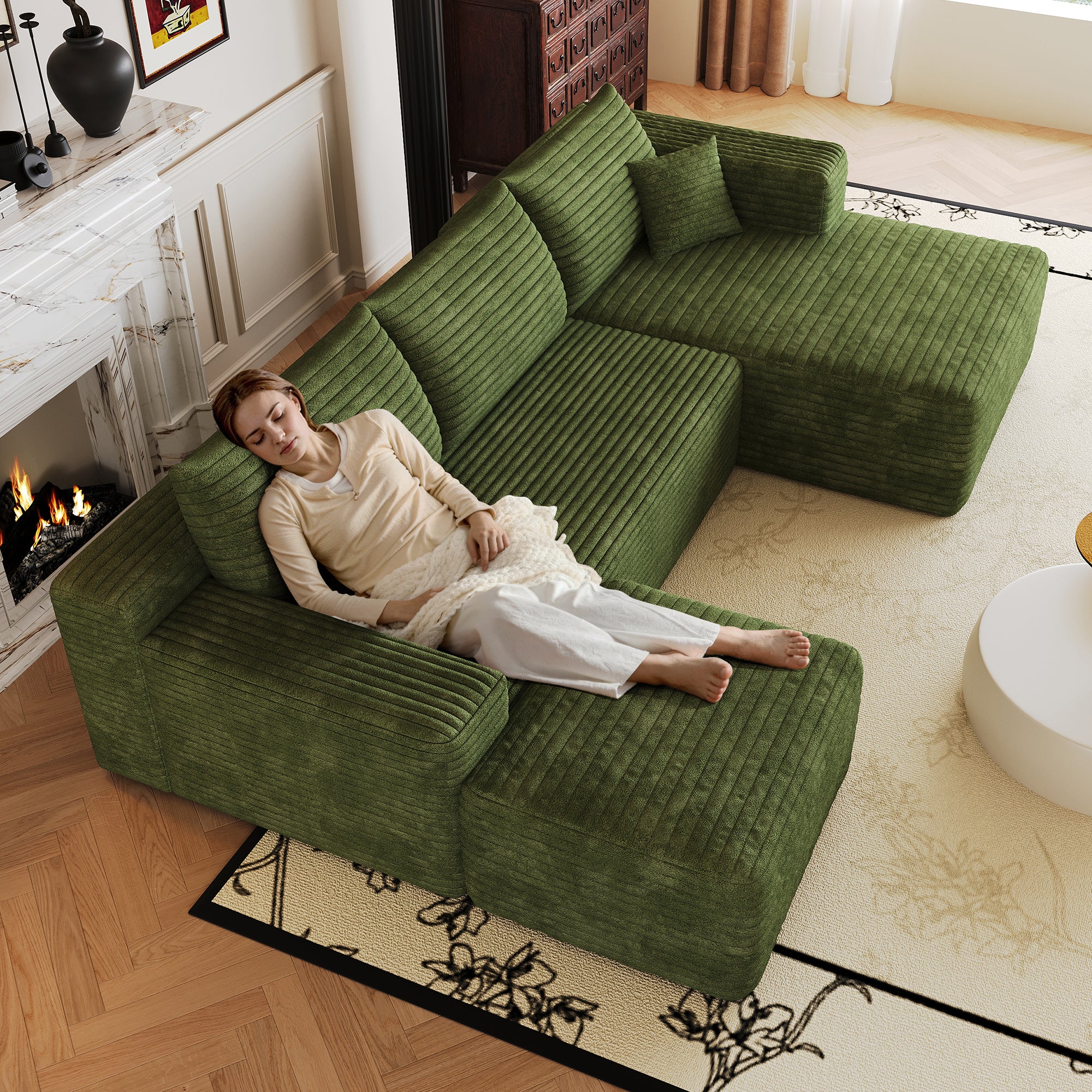 Modern minimalist green sectional sofa, angled view
