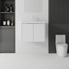 24 inch floating bathroom vanity in white with ceramic sink, front view