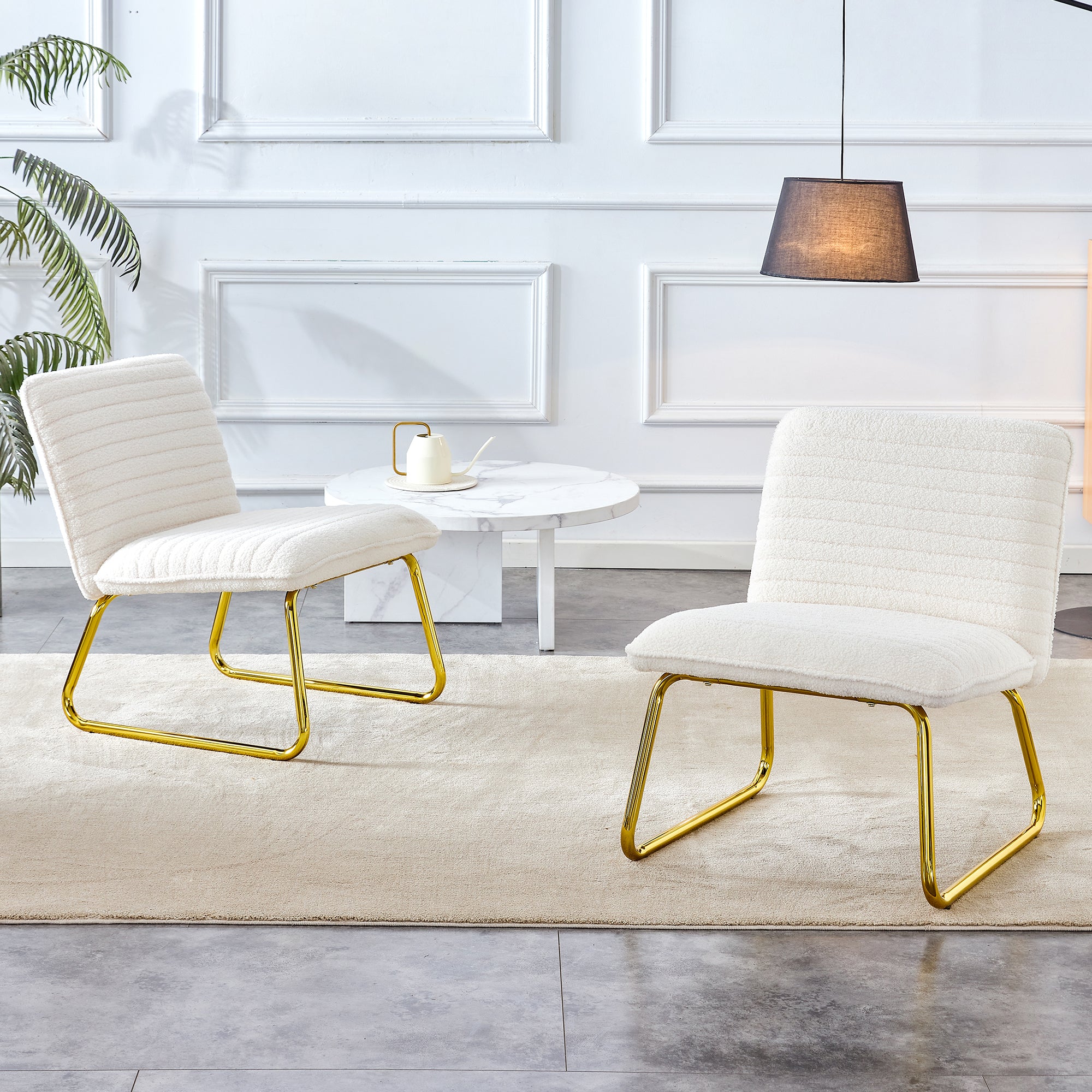 One White minimalist armless sofa chair with plush cushion and backrest paired with golden metal legs, suitable for offices, restaurants, kitchens, bedrooms