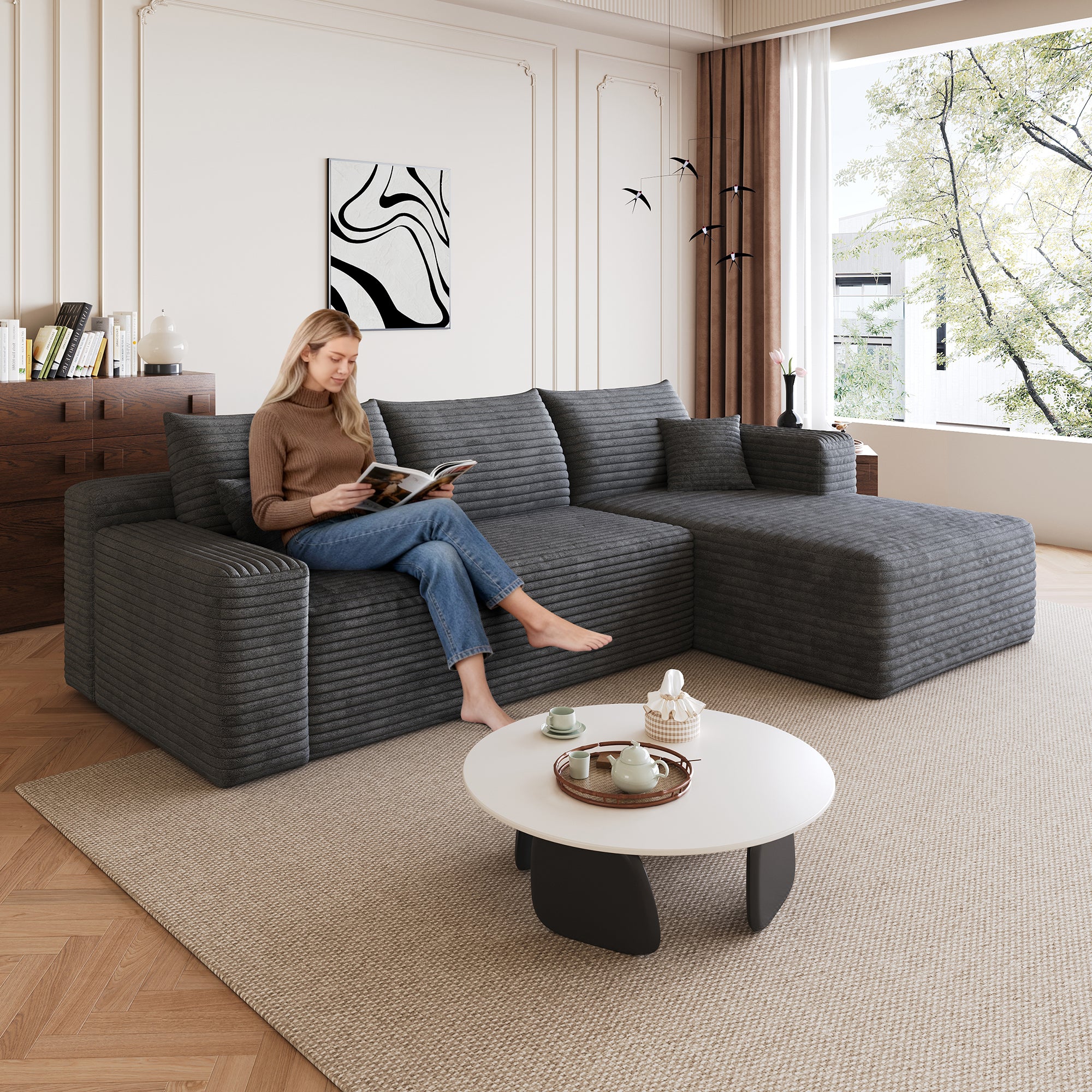 Dark grey corduroy U-shaped sectional sofa, angled corner view
