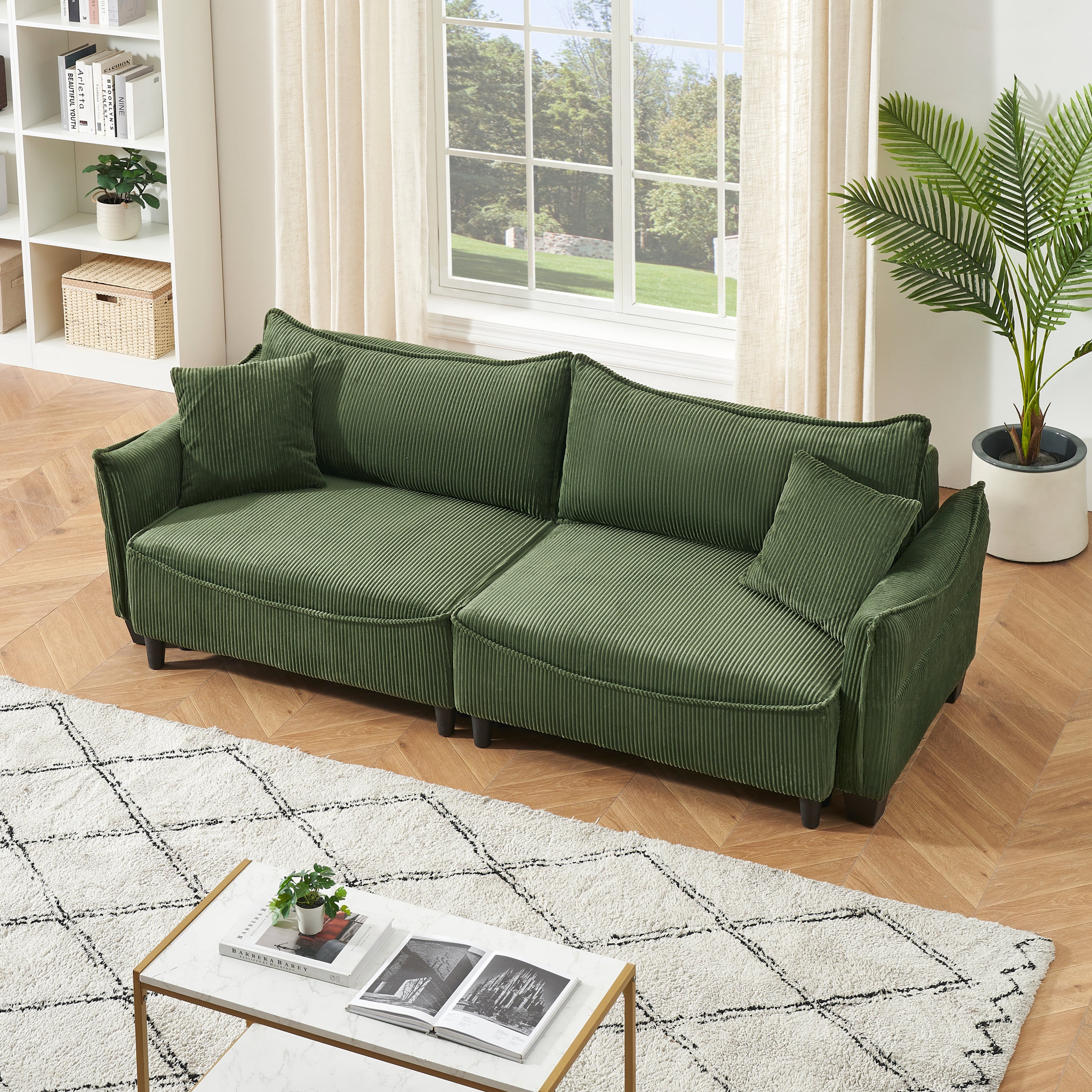 Sofa Showcasing Green Corduroy Fabric, Transformable into Sofa Bed with Two Throw Pillows: Ideal for Living Rooms & Diverse Scenes