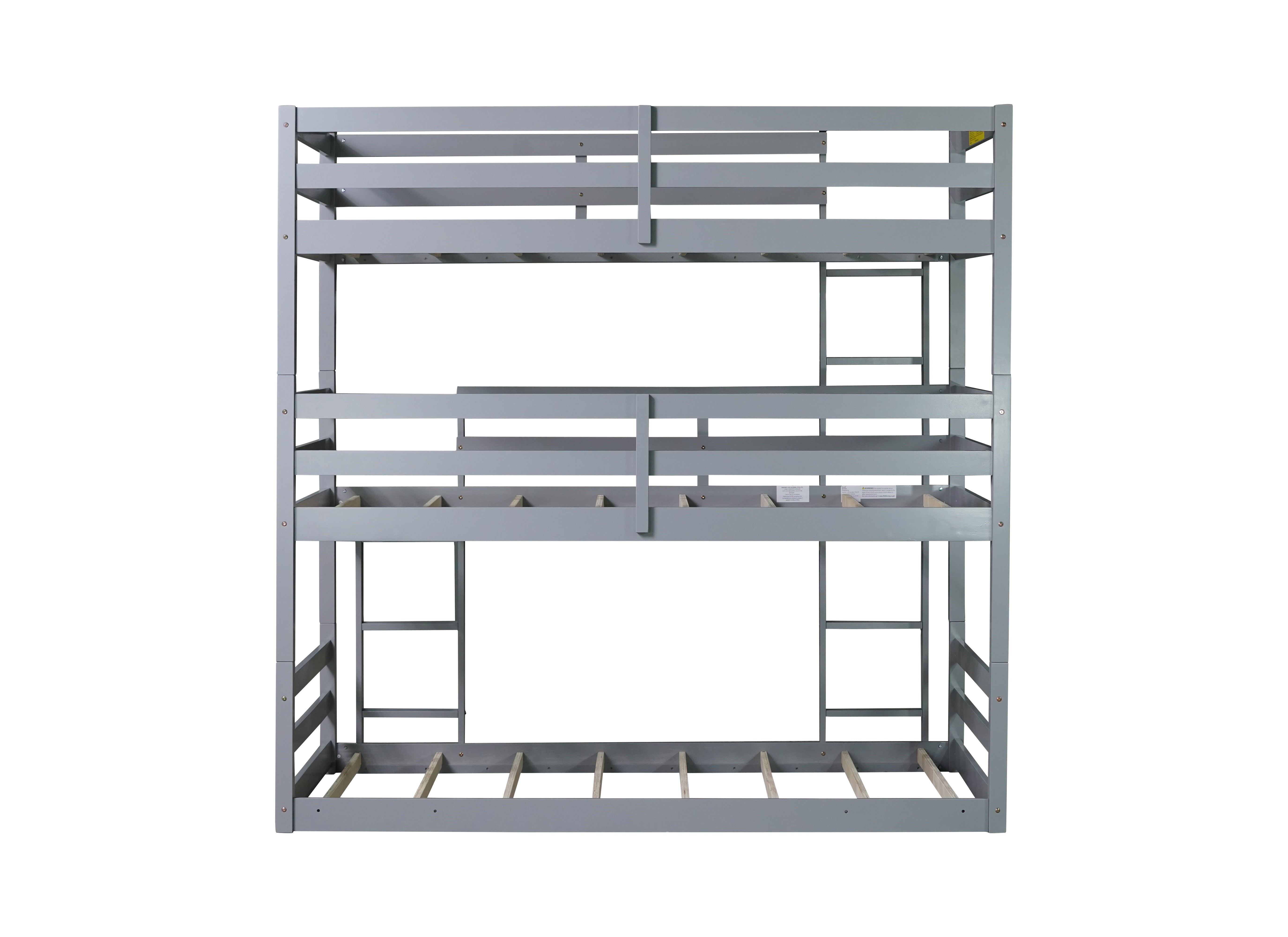 Detachable triple twin bunk bed in a bedroom