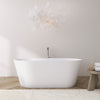 63 inch freestanding solid surface soaking bathtub, white, full front view