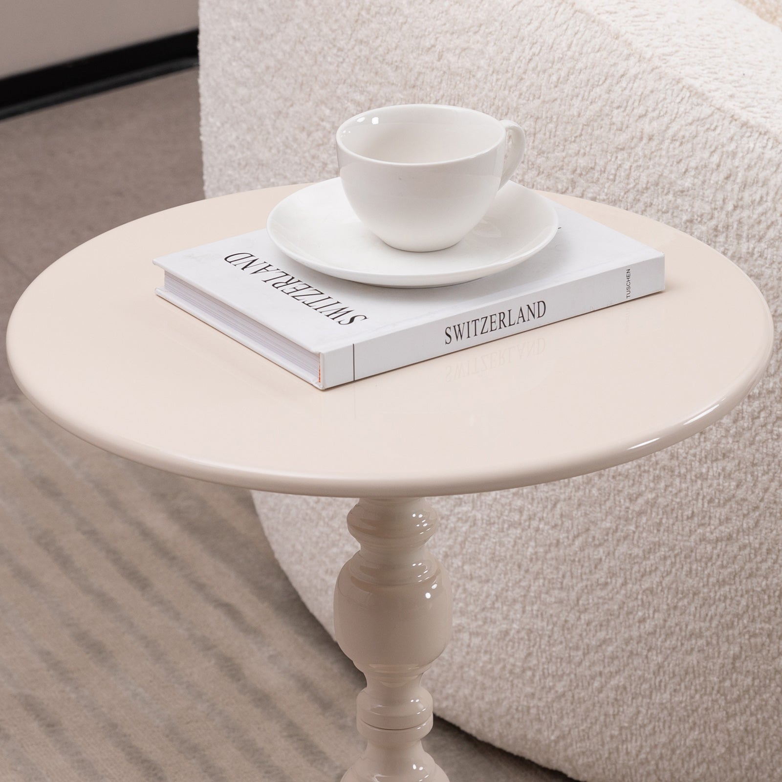 Round metal side table in vintage finish, sofa-side setting