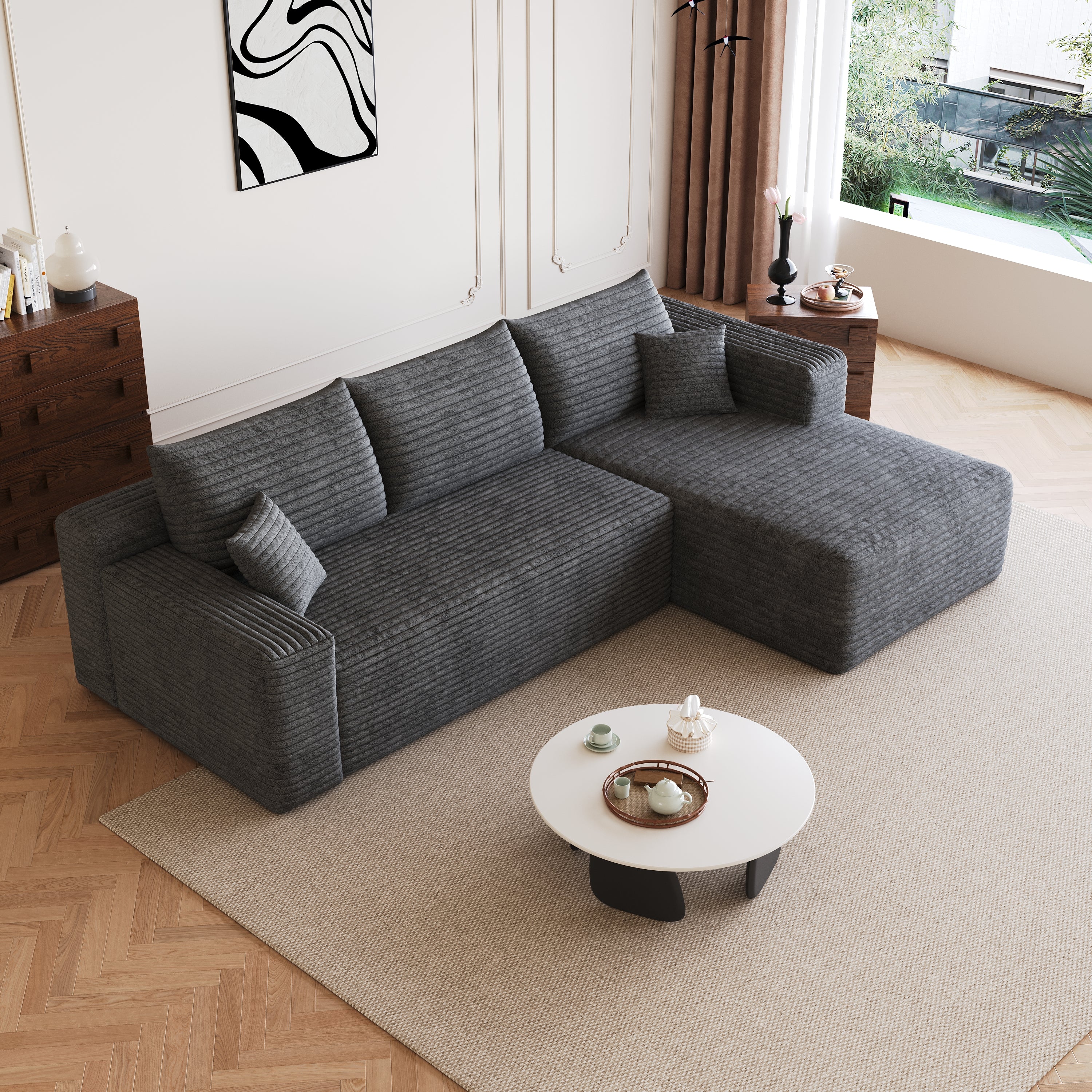 Dark grey U-shaped sectional sofa, side profile view