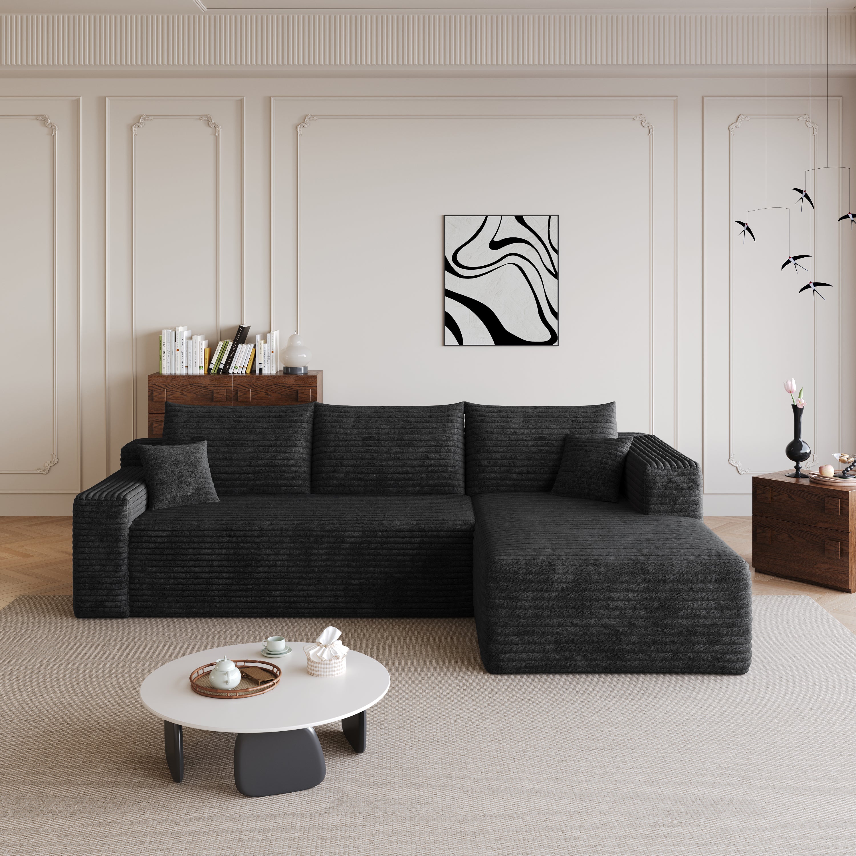 Black corduroy U-shaped cloud sectional sofa in living room setting