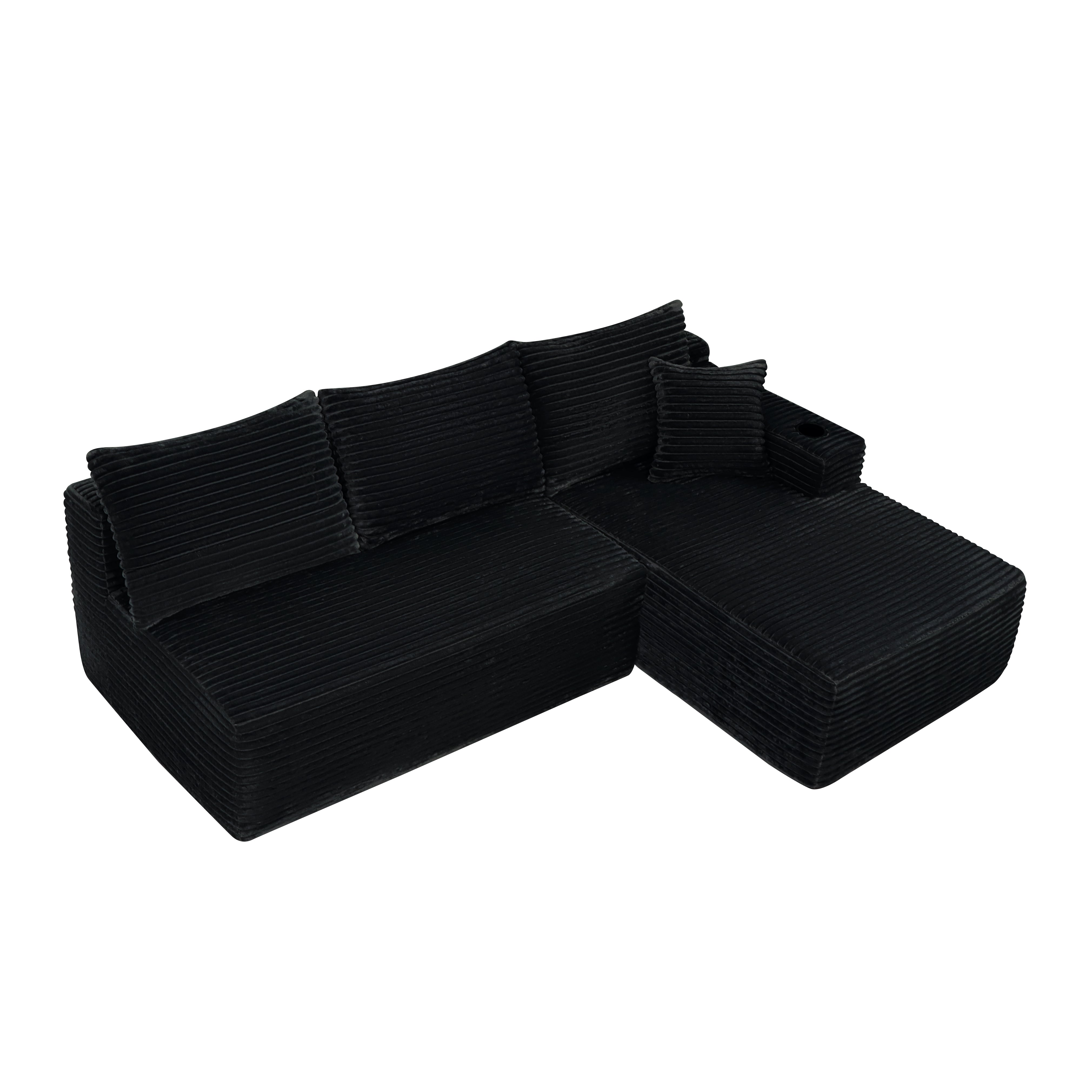 Black plush fabric sectional sofa L-shape chaise, detail view
