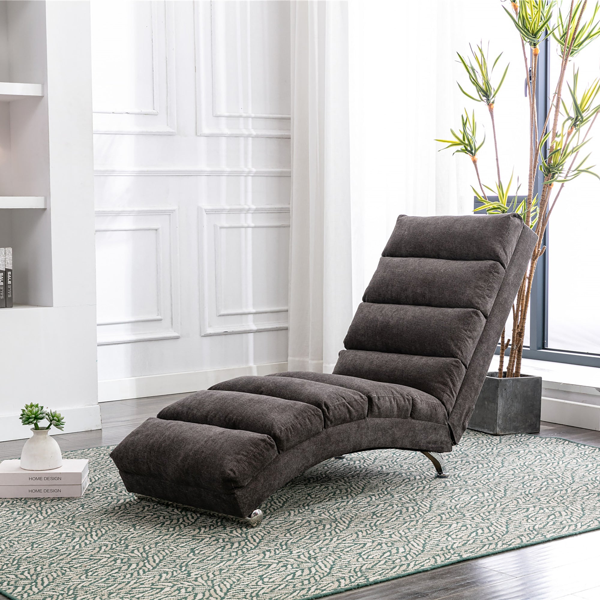Upholstered chaise lounge fixed-back recliner, side profile view