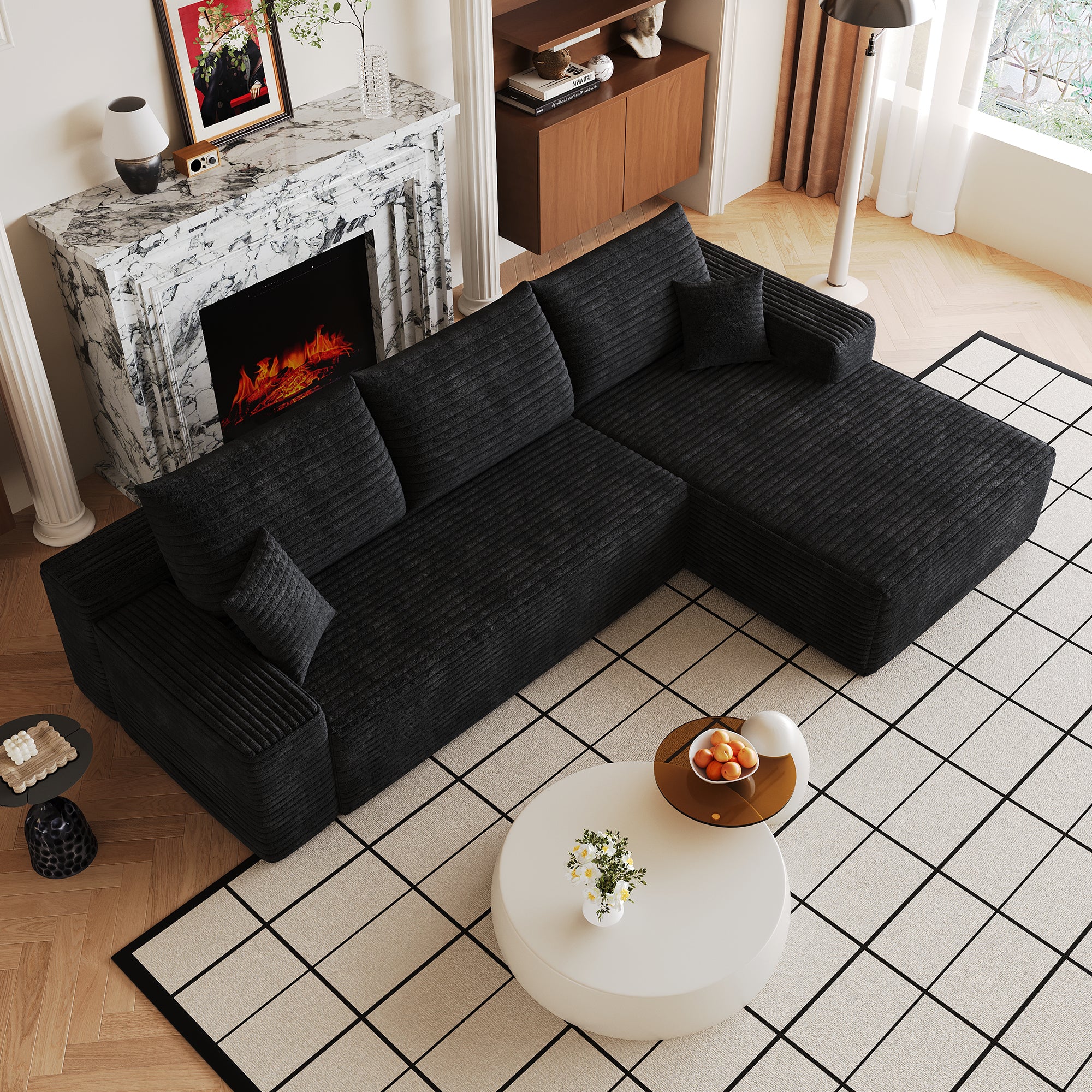 Black corduroy sectional sofa with deep seat, side view
