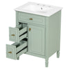 Green bathroom vanity with open drawers showing storage