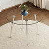 Round dining table with glass top, silver metal legs, exquisite life, starting from the details, the silver legs show an extraordinary texture, which is the finishing touch to your home