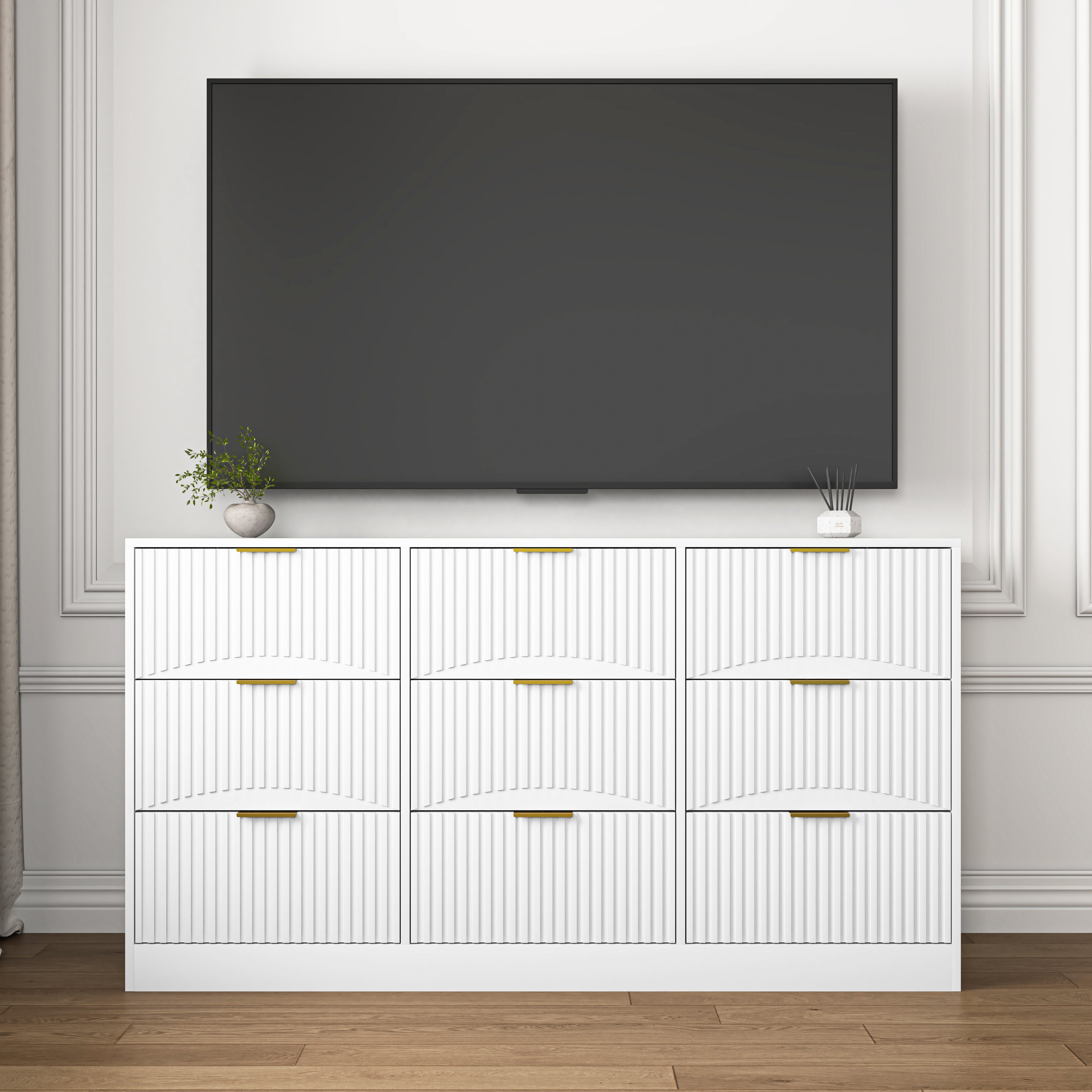 White 9-drawer dresser in bedroom setting, side profile