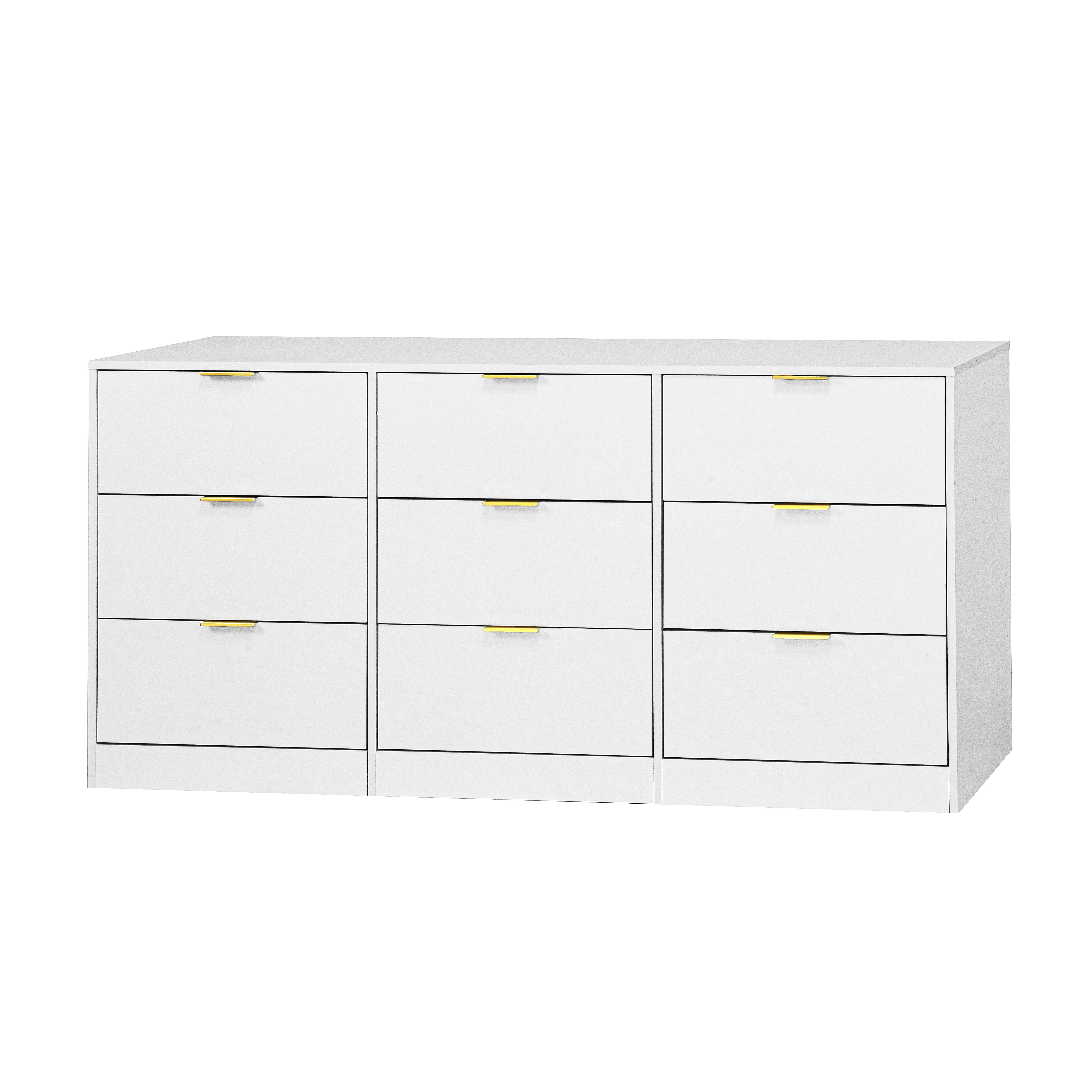 White wooden dresser in bedroom setting, styled view