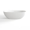 Freestanding solid surface soaking bathtub, white, angled side view