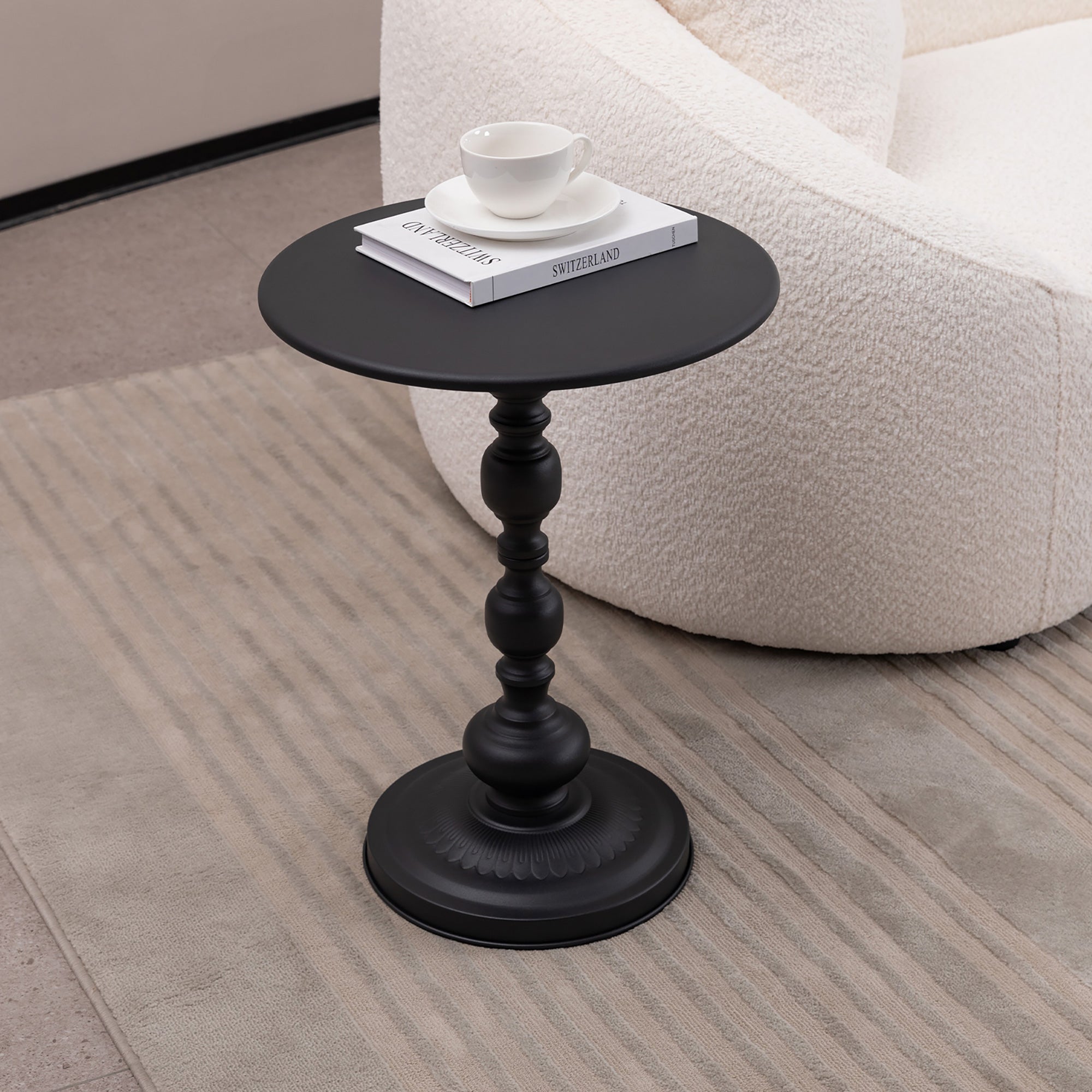Round vintage metal side table, black finish, front view