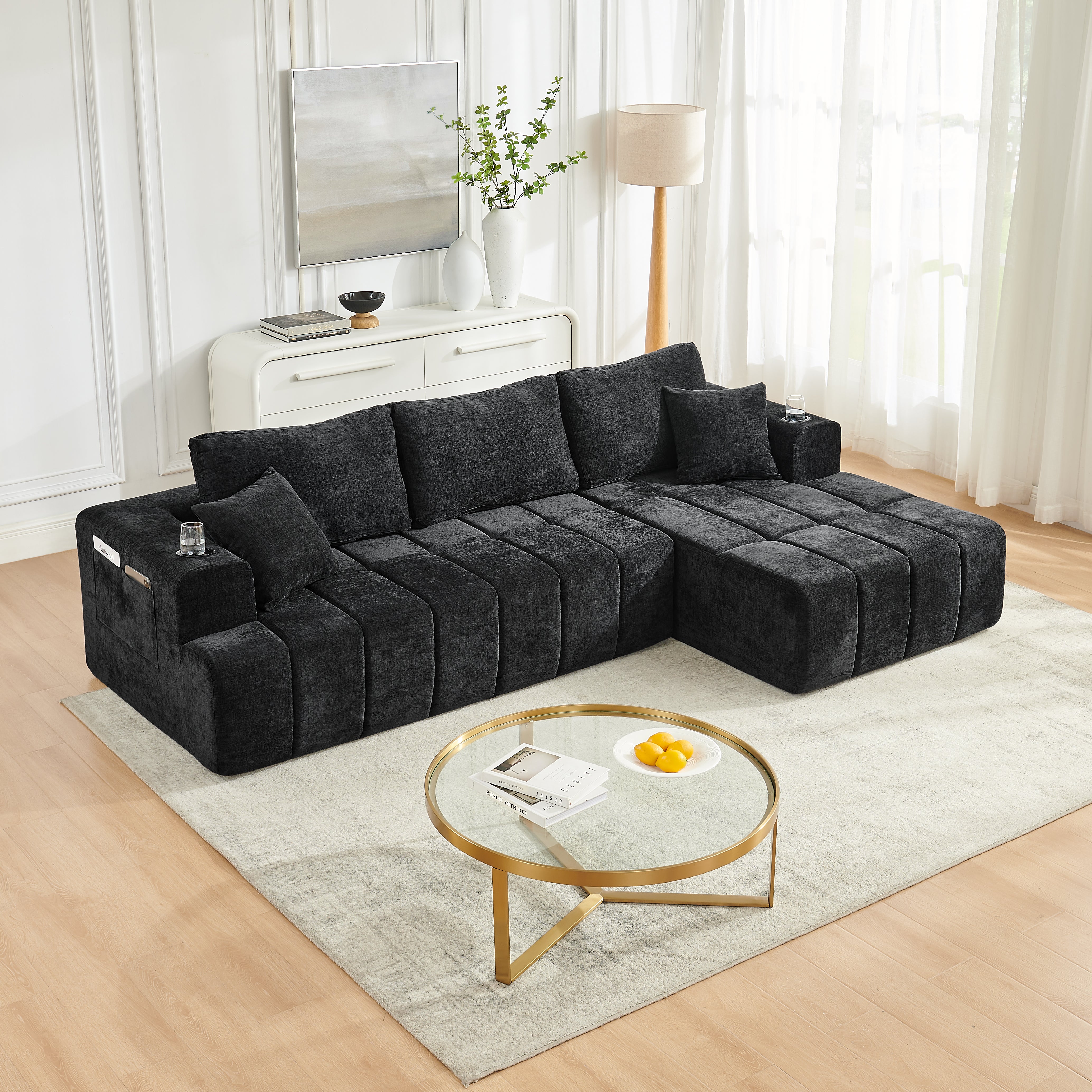 Black chenille cloud-style sectional sofa with chaise, angled view