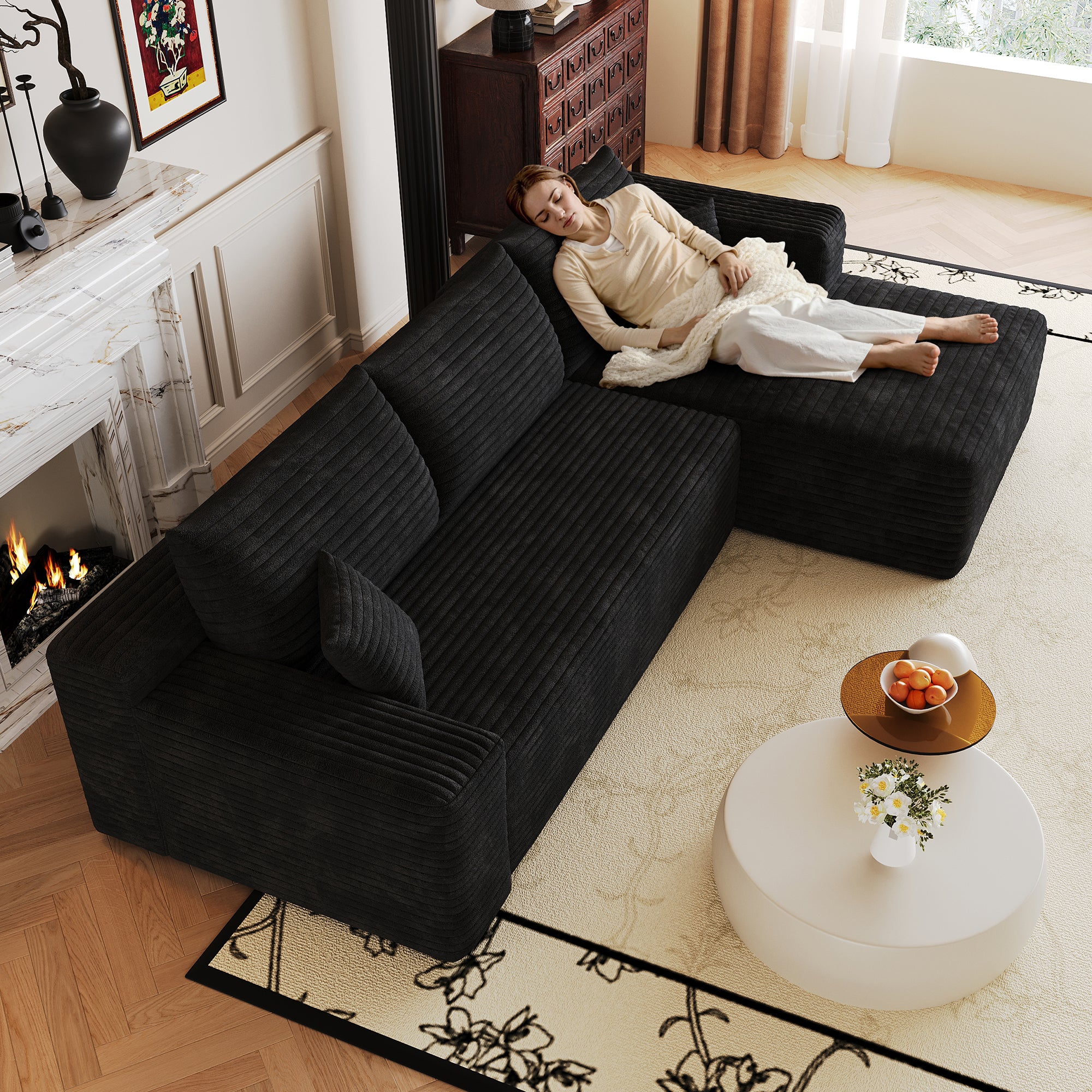 Black corduroy deep-seat sectional sofa fabric texture detail