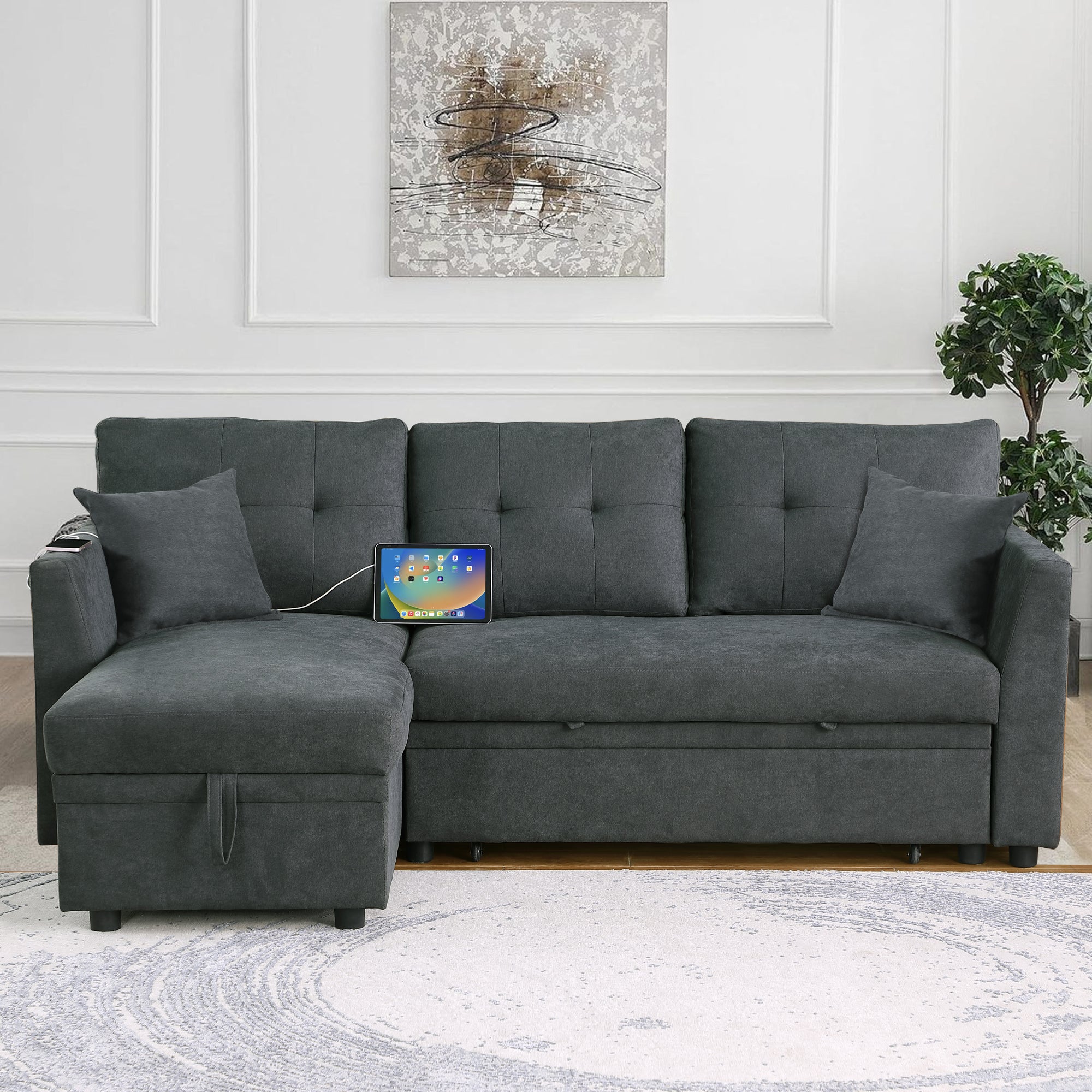 Reversible chaise sectional sofa bed styled in living room, corner view