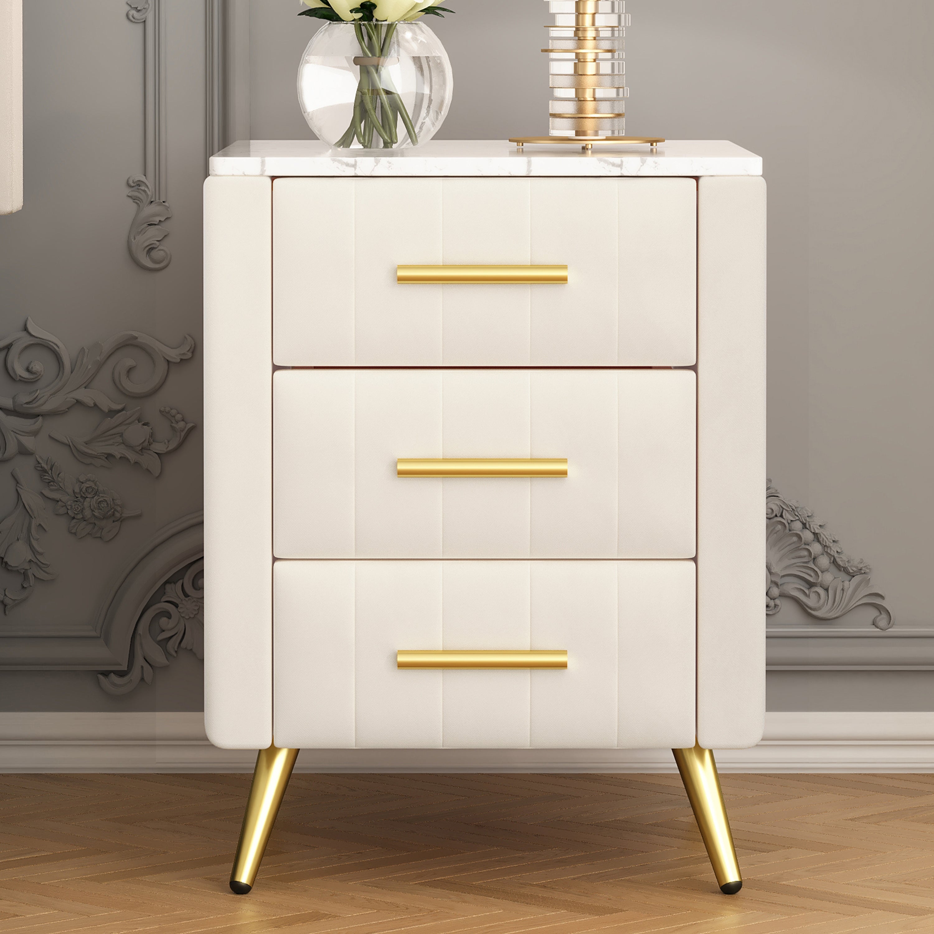 Beige bedside table with three drawers open, storage detail