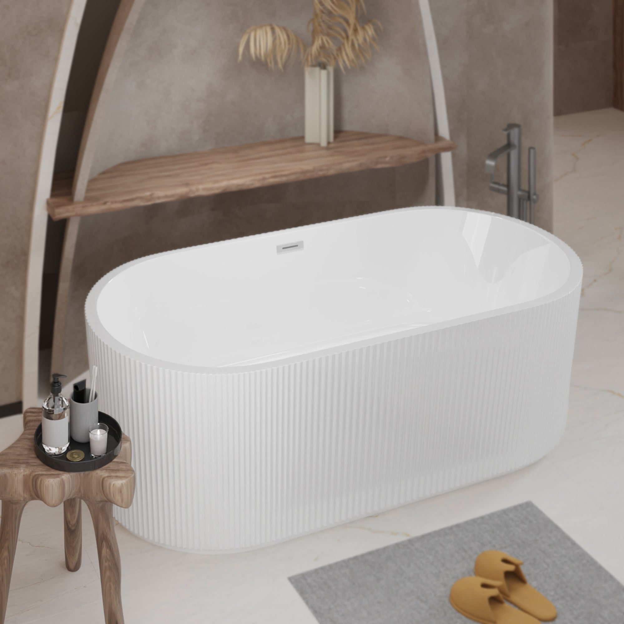 Glossy white freestanding soaker tub, angled side view